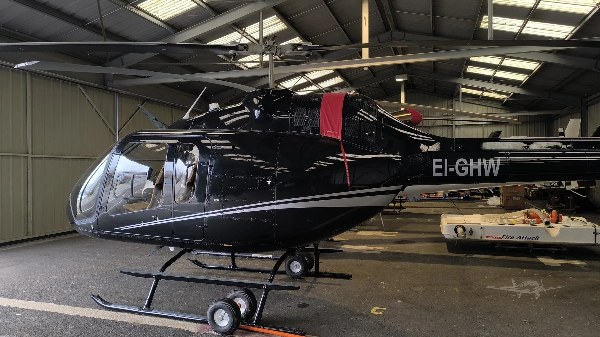 Exterior view of a 2018 BELL 505 JET RANGER X, EI-GHW.