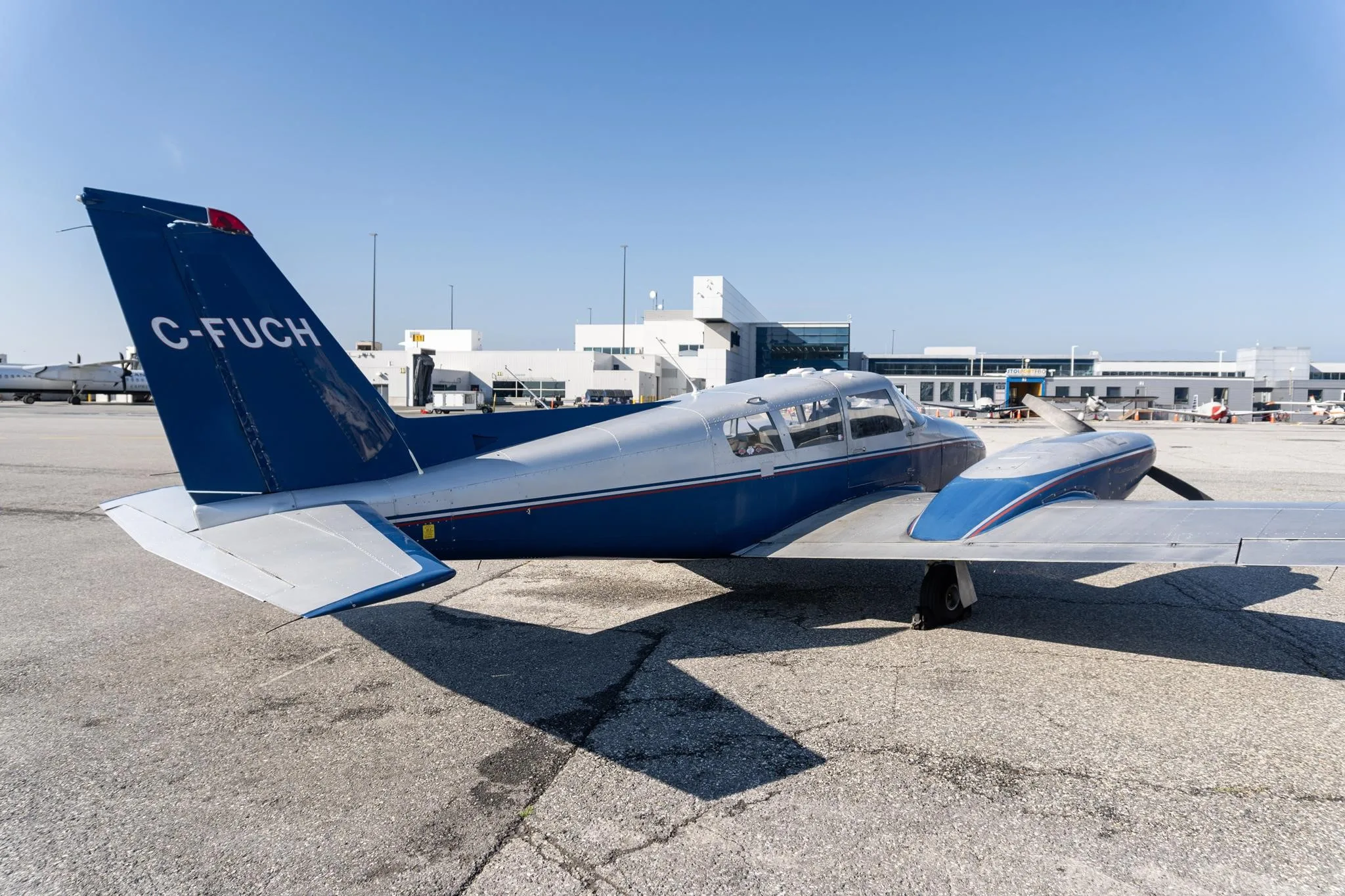 Exterior view of a 1966 PIPER TWIN COMANCHE, C-FUCH.