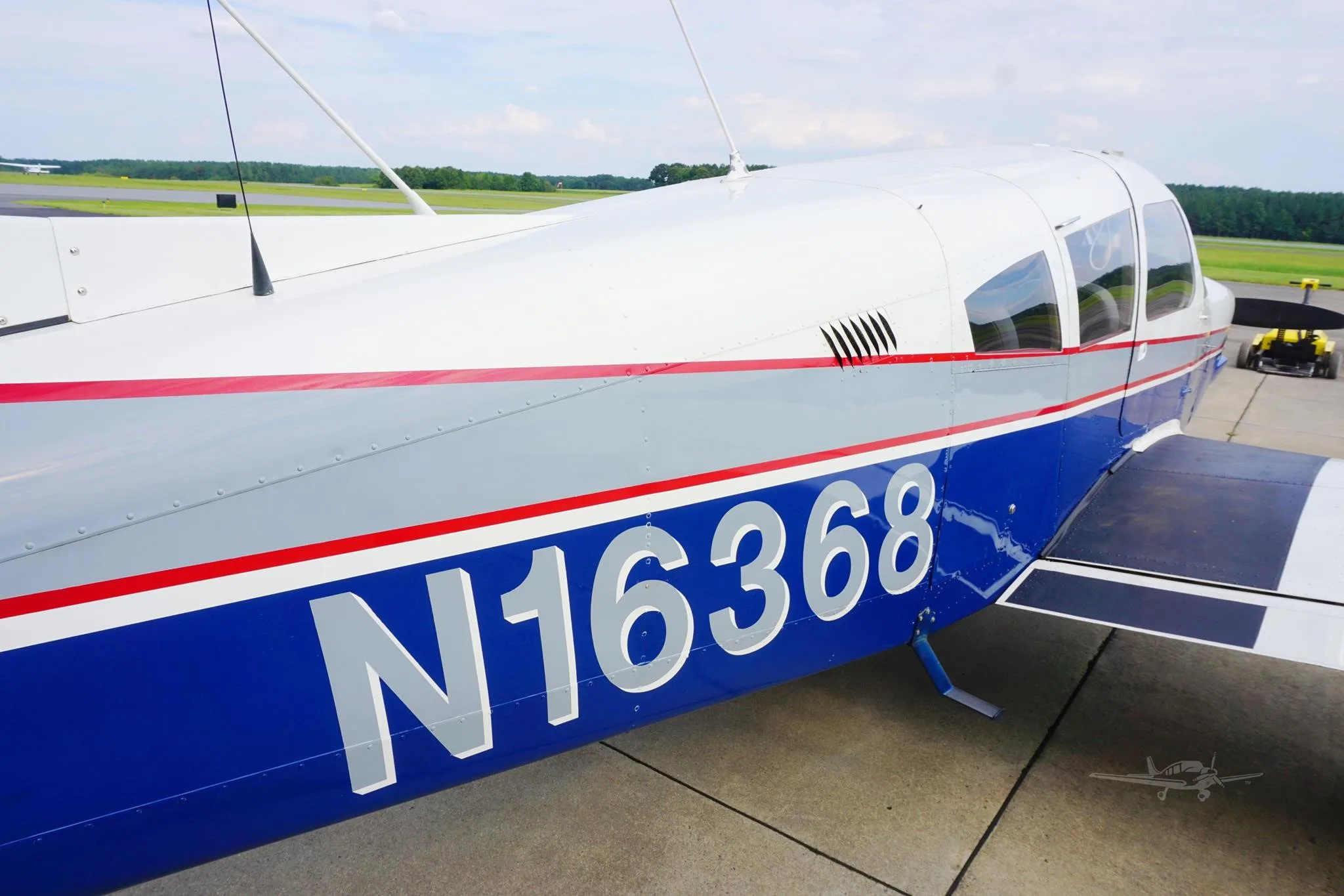 Exterior view of a 1973 PIPER ARROW II, N16368.