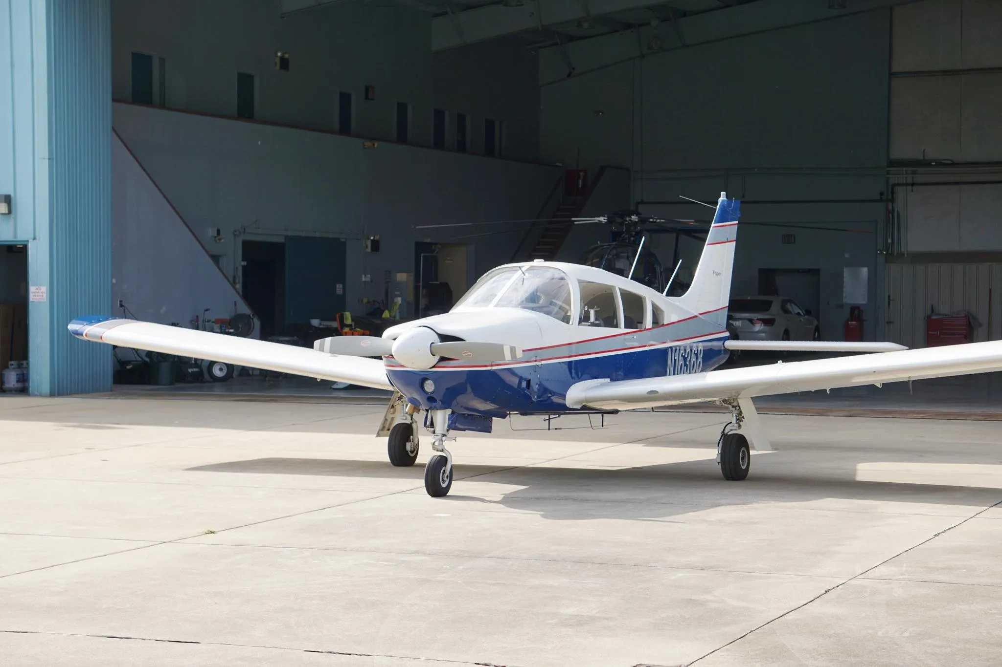 Exterior view of a 1973 PIPER ARROW II, N16368.