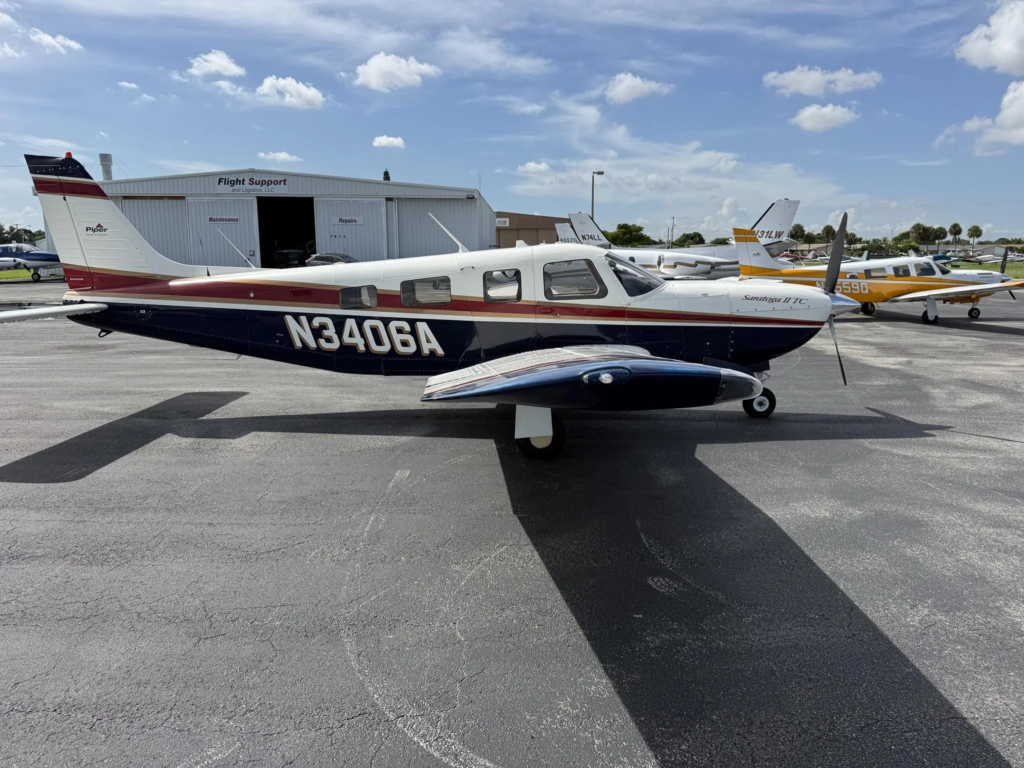 Exterior view of a 1998 PIPER SARATOGA II TC, N3406A.