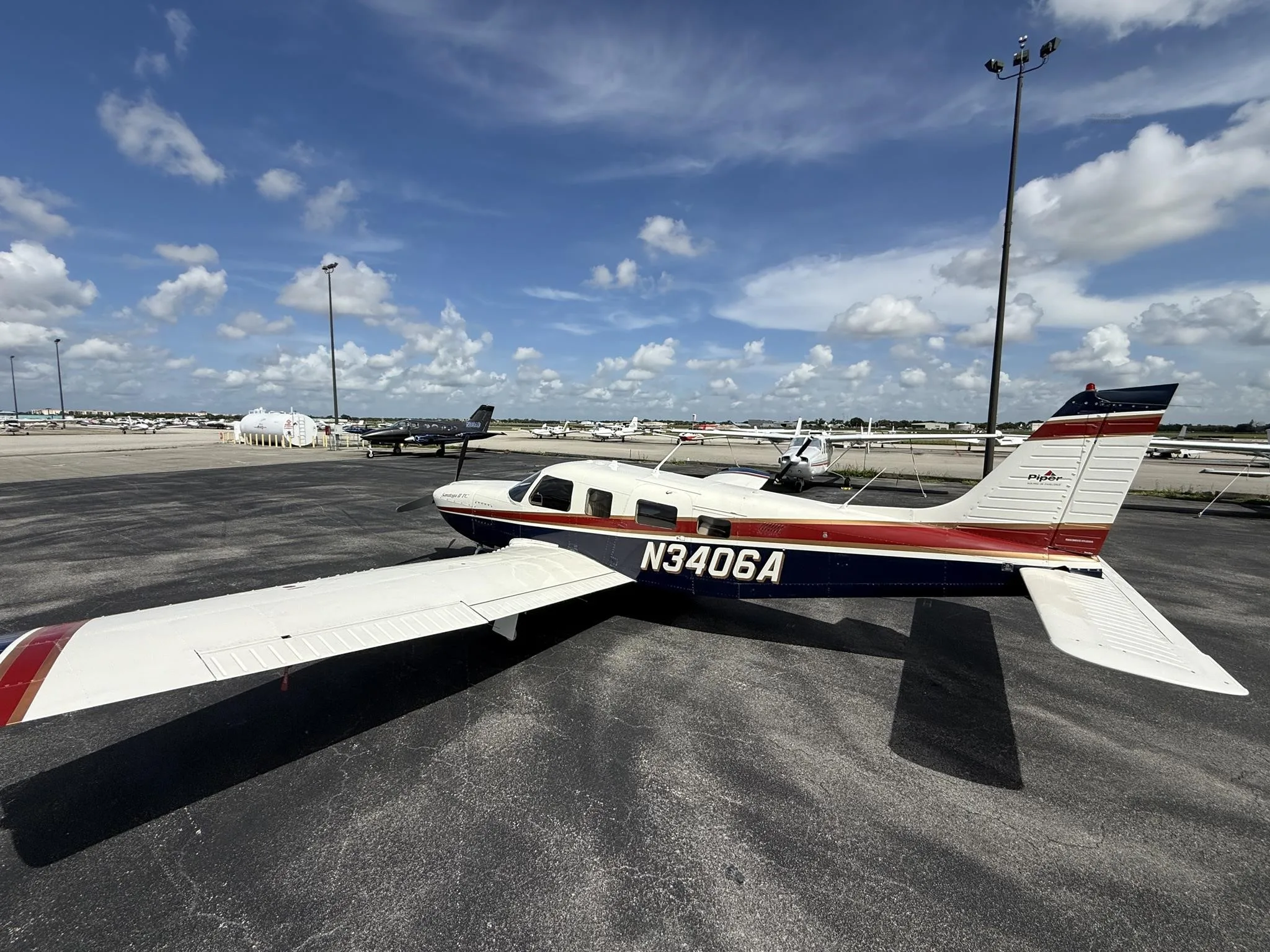 Exterior view of a 1998 PIPER SARATOGA II TC, N3406A.