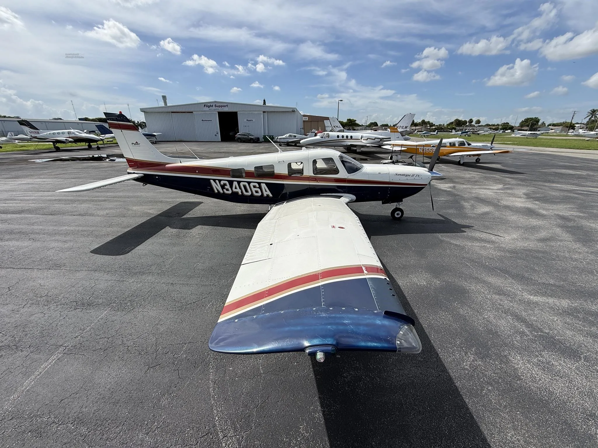 Exterior view of a 1998 PIPER SARATOGA II TC, N3406A.