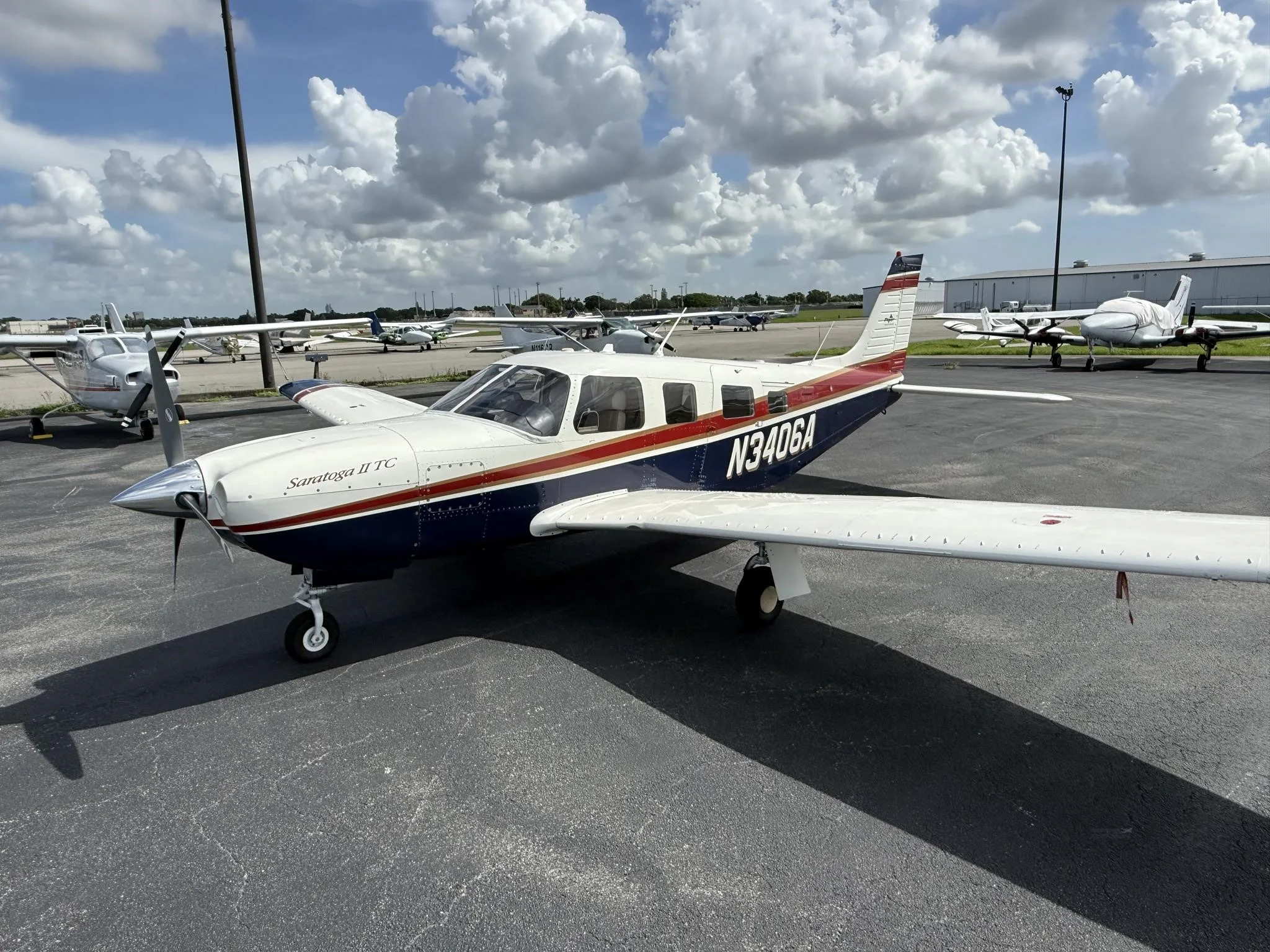 Exterior view of a 1998 PIPER SARATOGA II TC, N3406A.