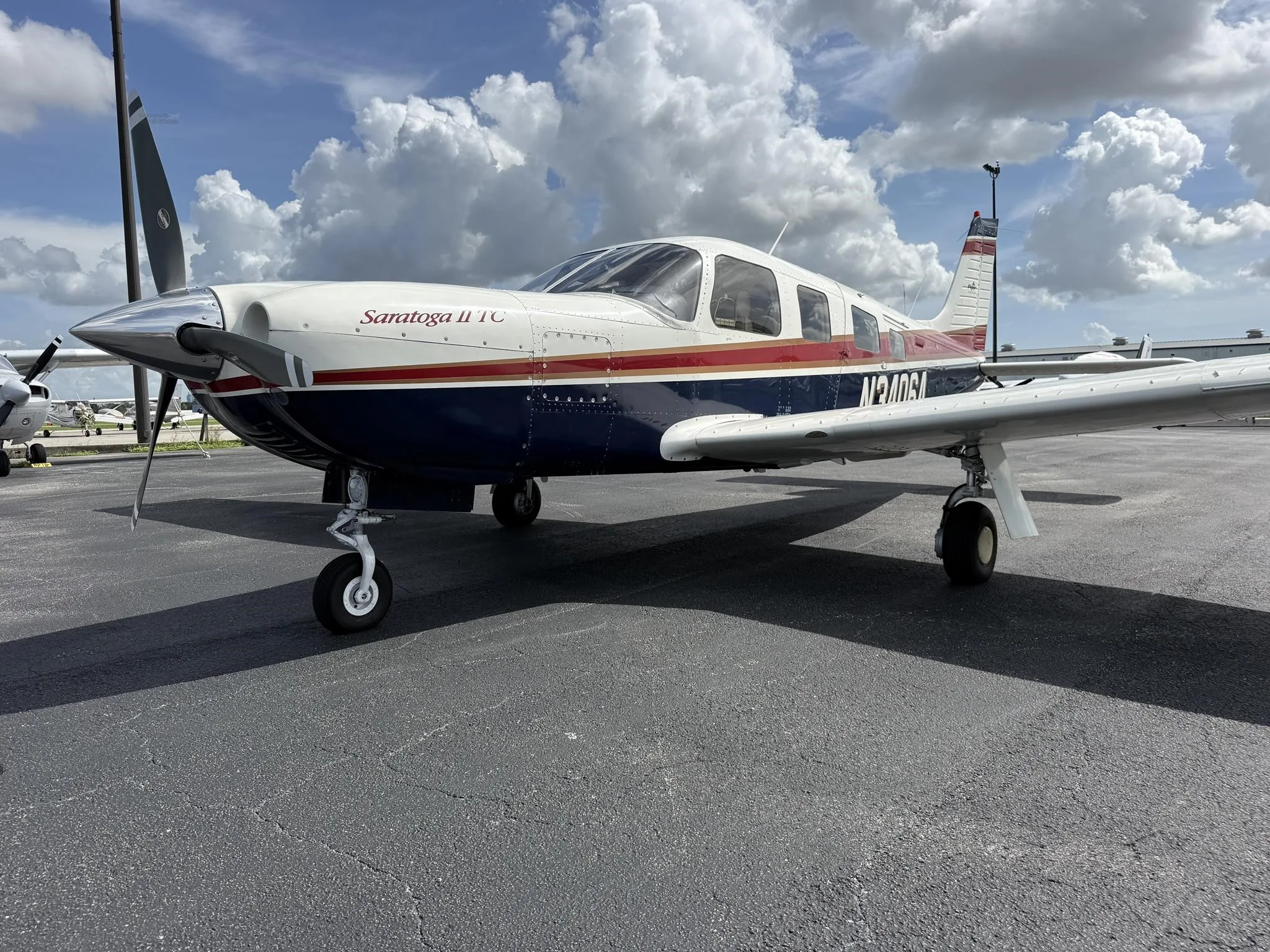 Exterior view of a 1998 PIPER SARATOGA II TC, N3406A.