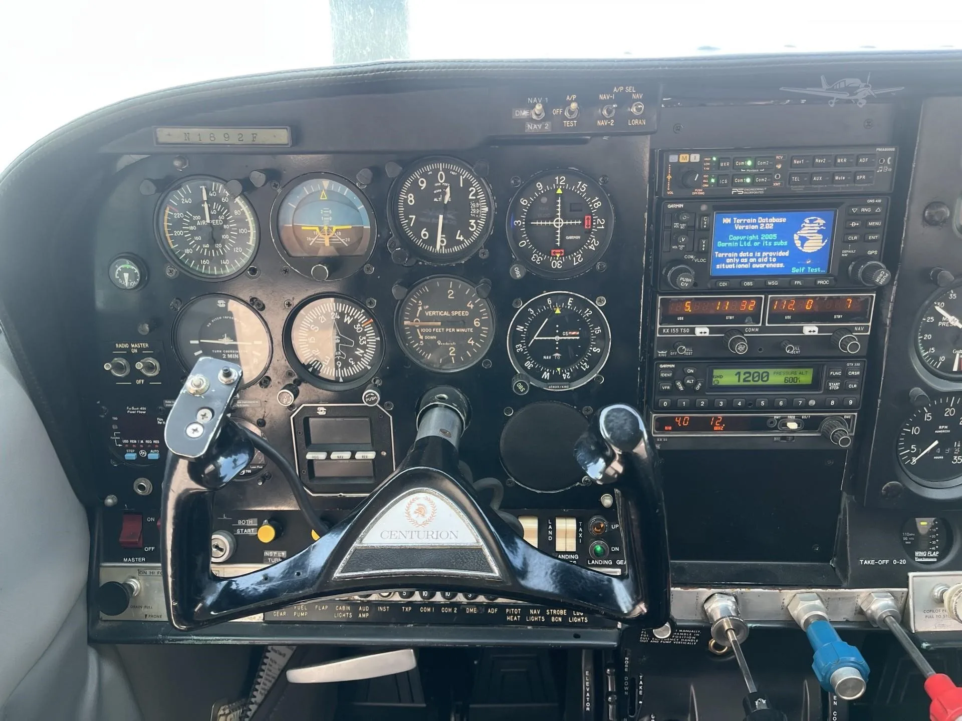 Cockpit and instrument panel of a 1966 CESSNA 210.