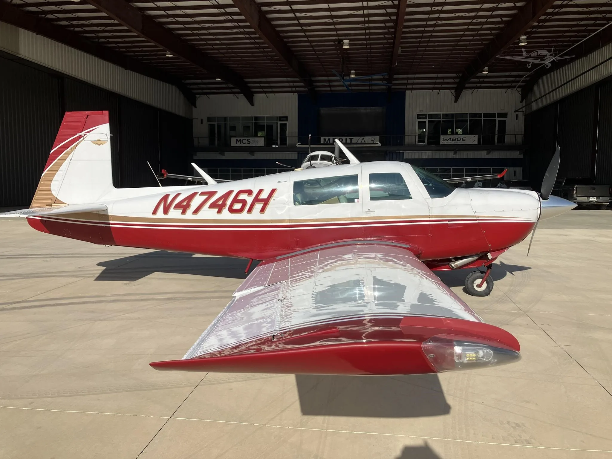 Exterior view of a 1979 MOONEY M20J 201, N4746H.