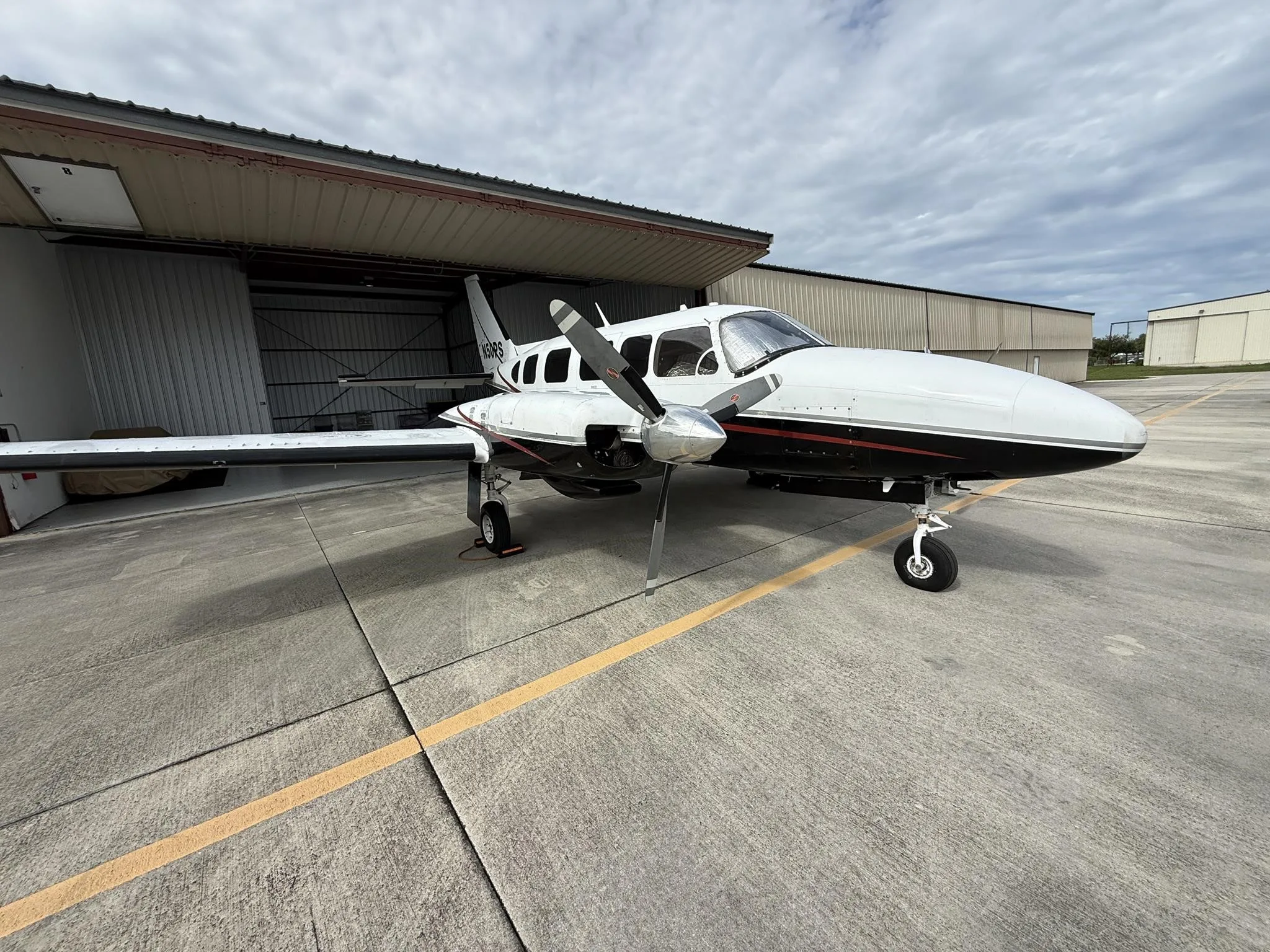 Exterior view of a 1974 PIPER NAVAJO CHIEFTAIN, N50PS.
