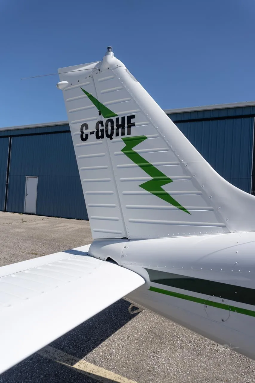 Exterior view of a 1977 PIPER ARCHER II, C-GQHF.