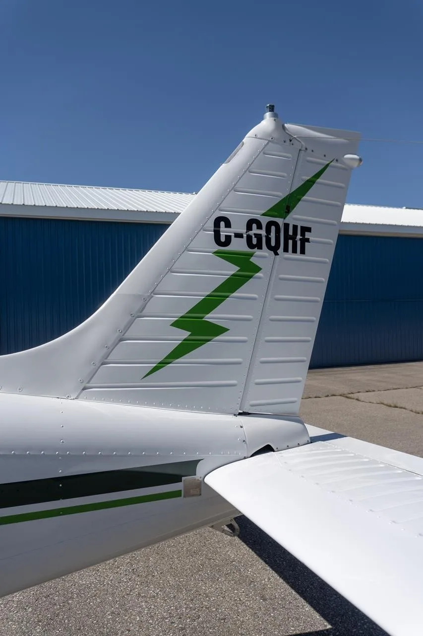 Exterior view of a 1977 PIPER ARCHER II, C-GQHF.