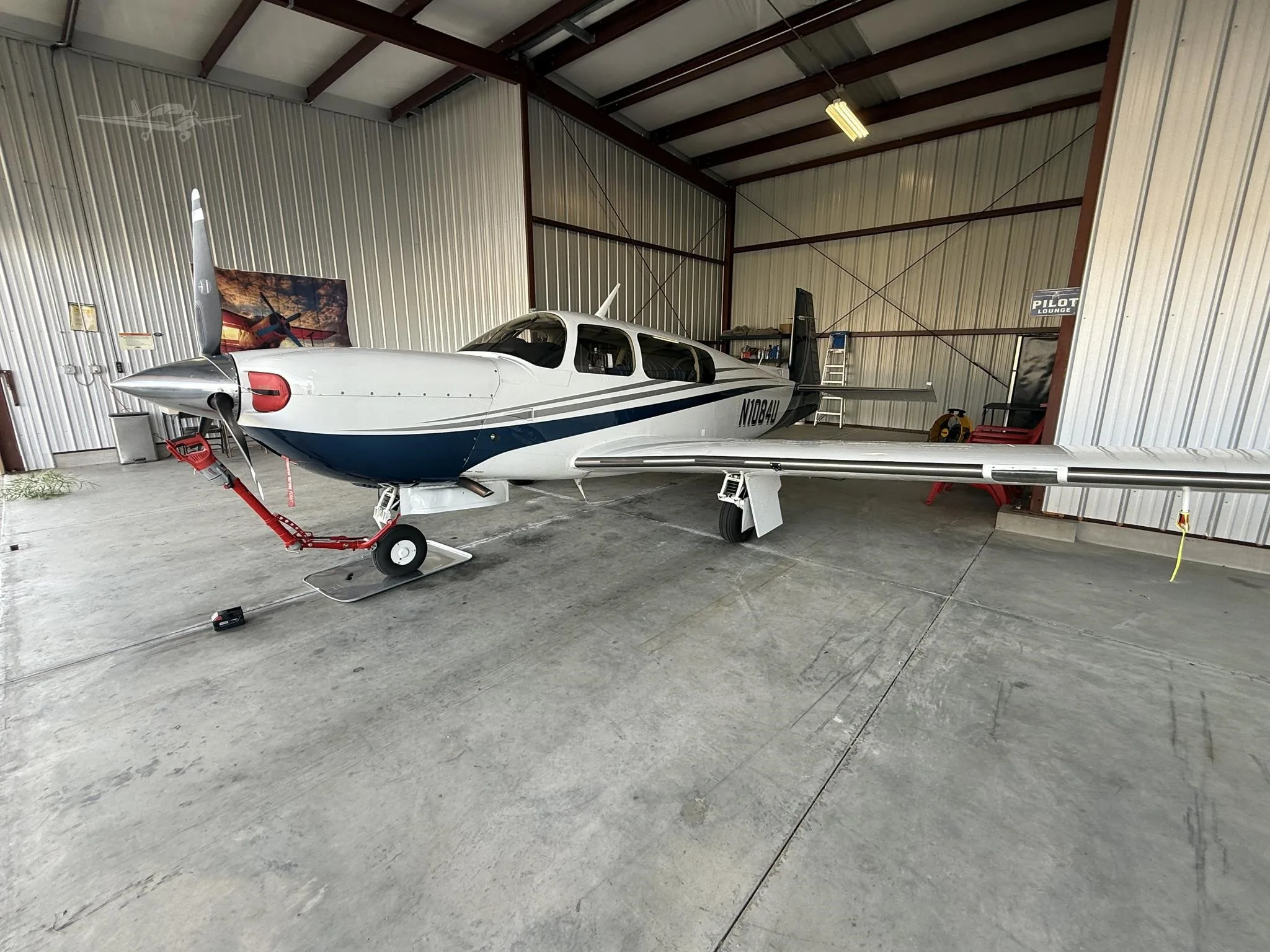 Exterior view of a 1995 MOONEY M20M BRAVO, N1084U.