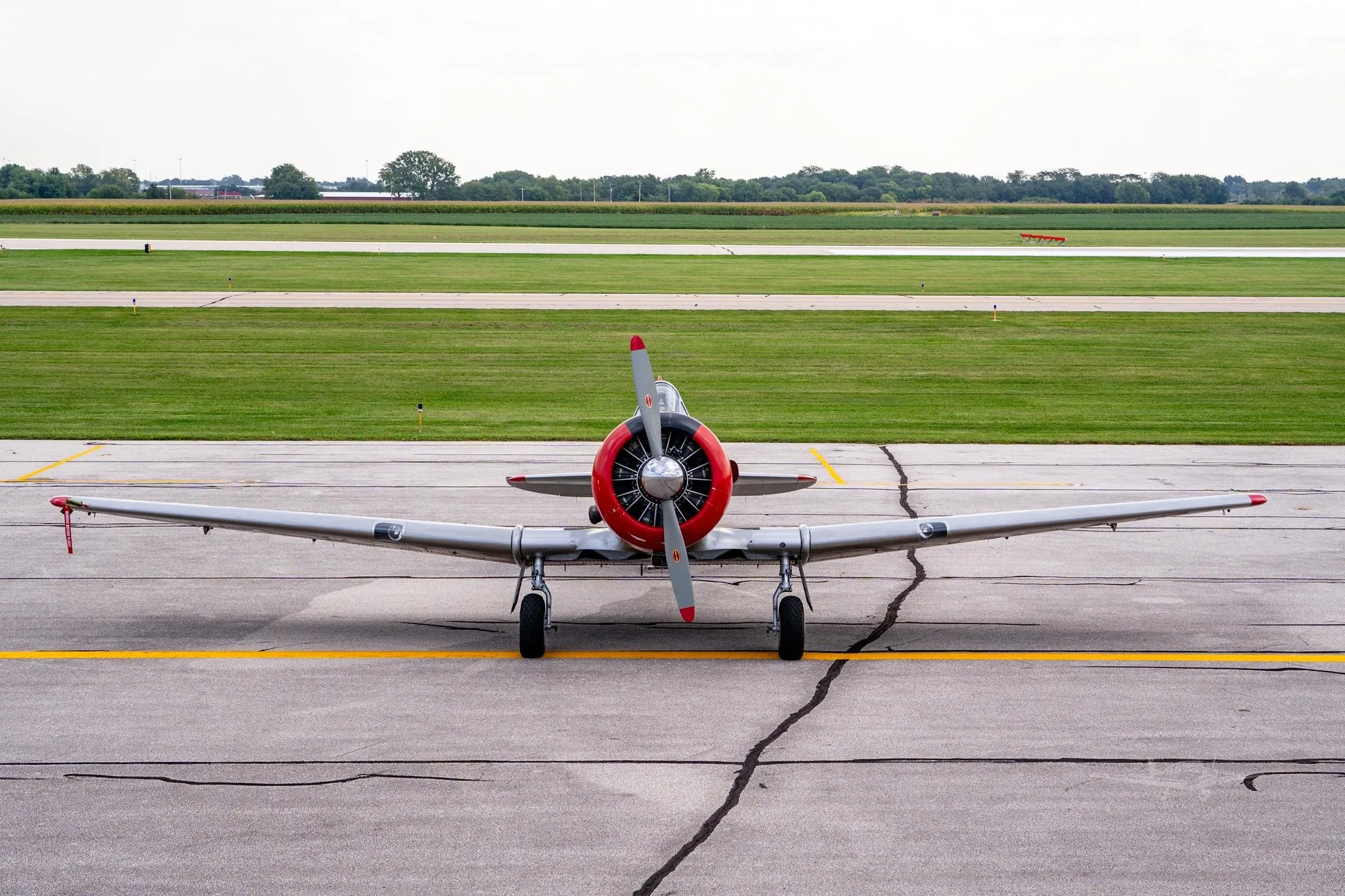 Exterior view of a 1951 NORTH AMERICAN AT-6G, N25KP.