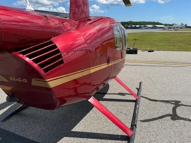 Exterior view of a 2003 ROBINSON R44 RAVEN I.