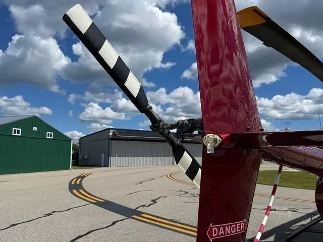 Exterior view of a 2003 ROBINSON R44 RAVEN I.