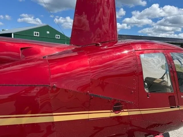 Exterior view of a 2003 ROBINSON R44 RAVEN I.