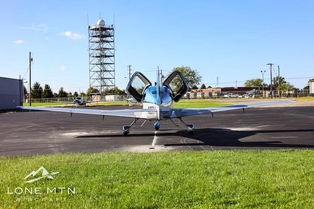 Exterior view of a 2013 CIRRUS SR22-G5, N250JH.