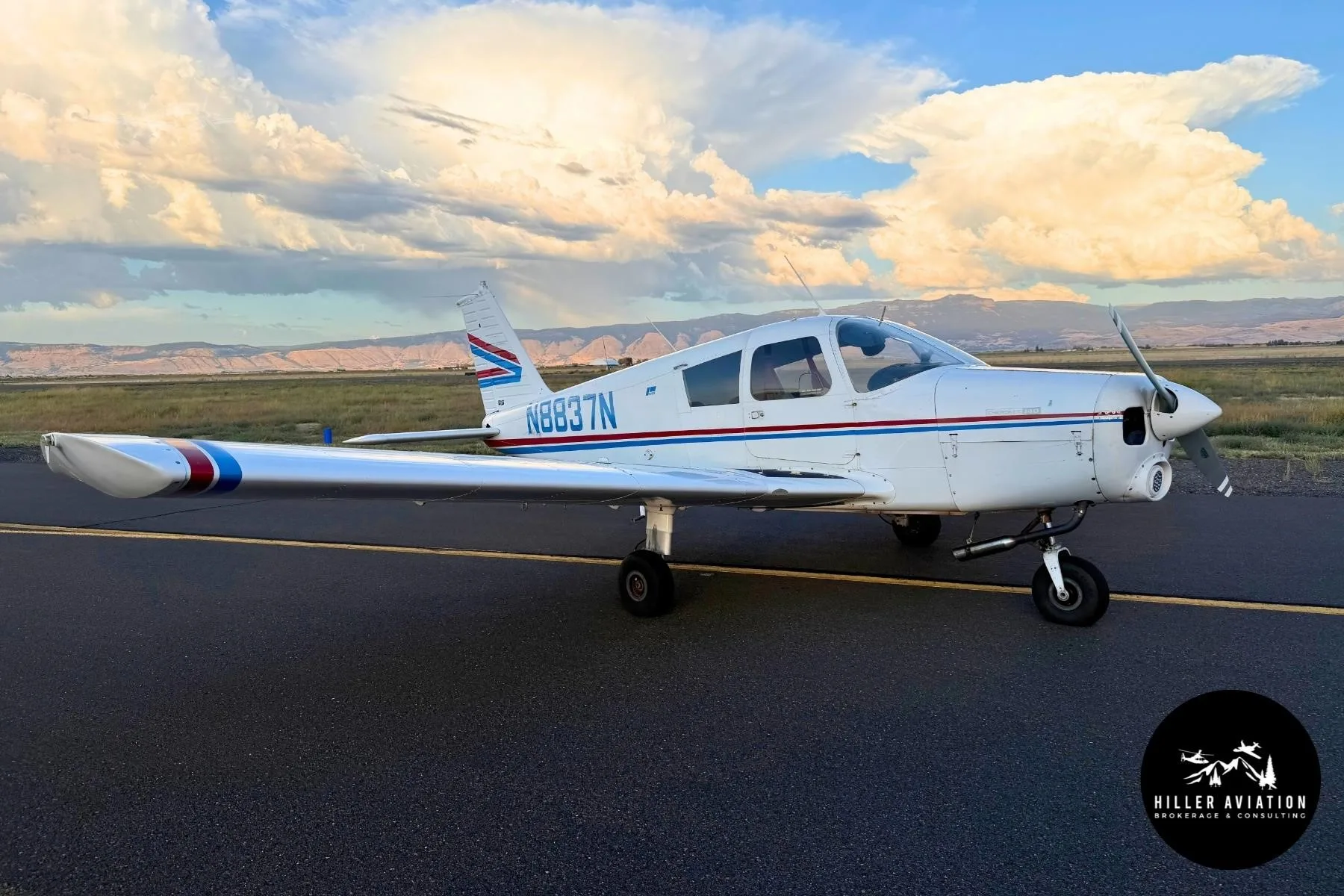Exterior view of a 1969 PIPER CHEROKEE 140, N8837N.