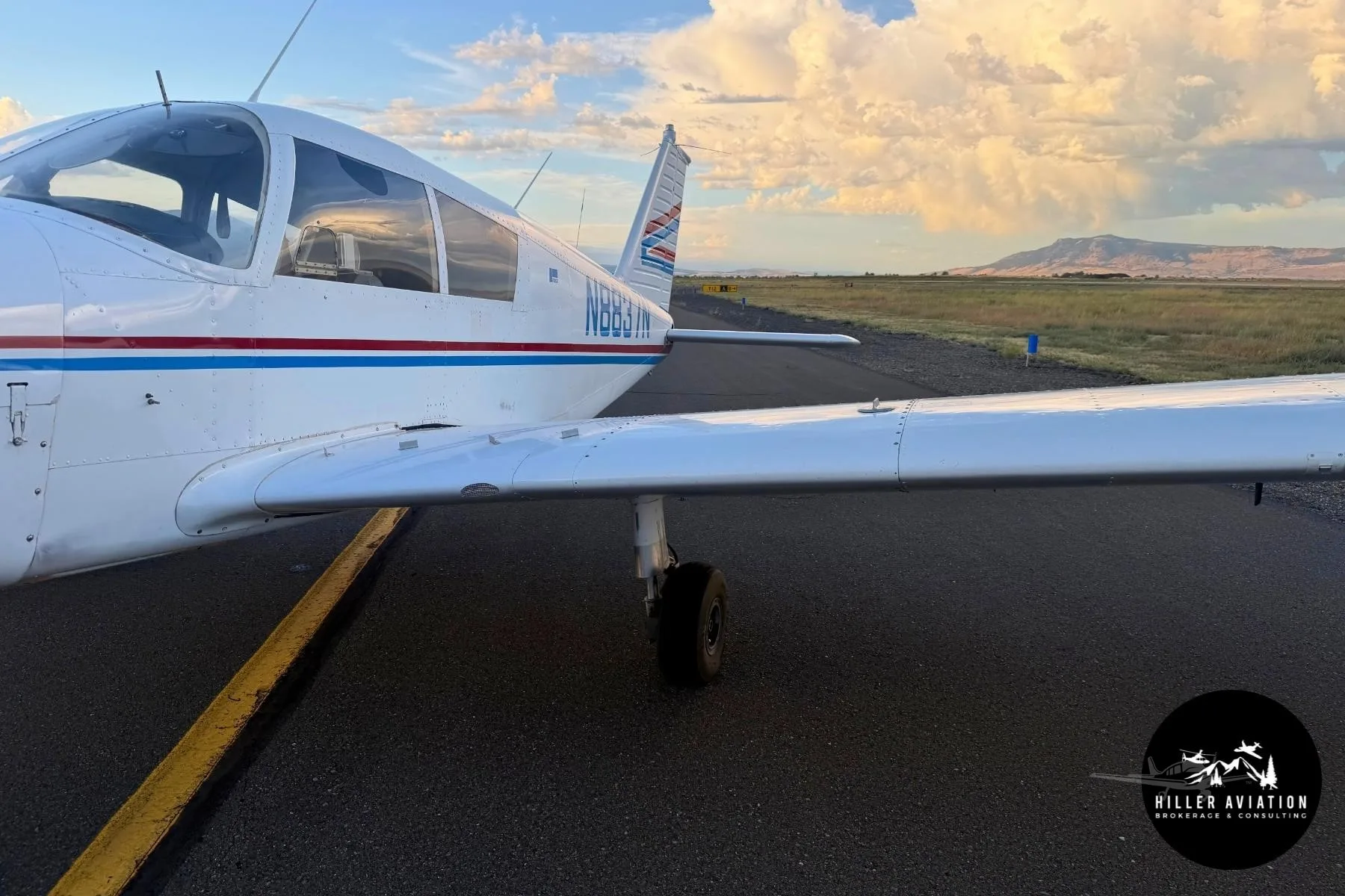 Exterior view of a 1969 PIPER CHEROKEE 140, N8837N.