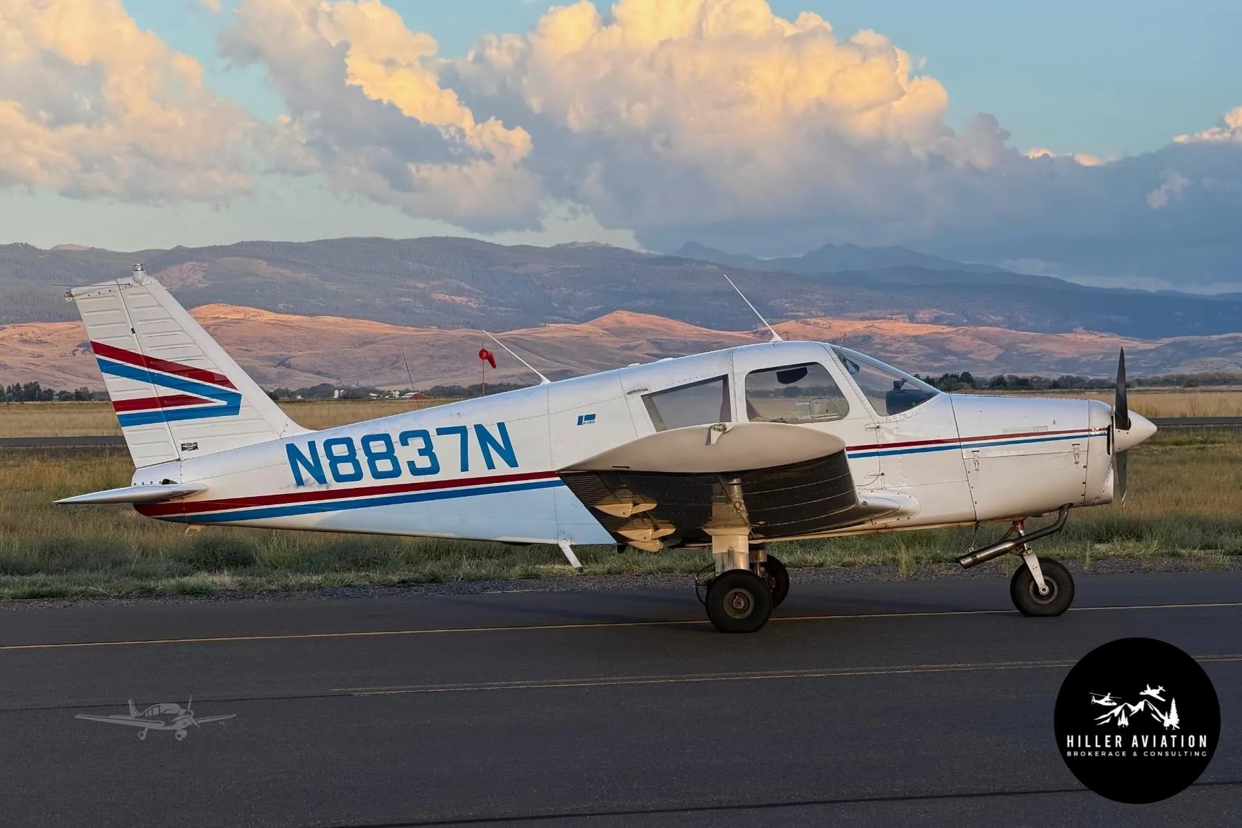 Exterior view of a 1969 PIPER CHEROKEE 140, N8837N.