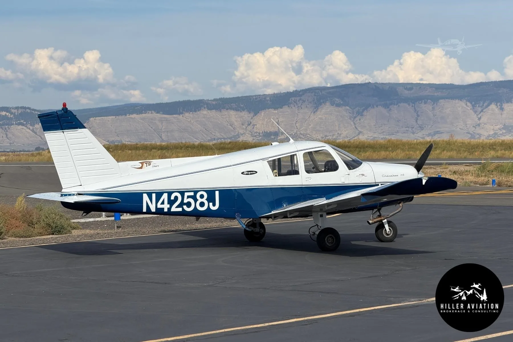 Exterior view of a 1967 PIPER CHEROKEE 140, N4258J.