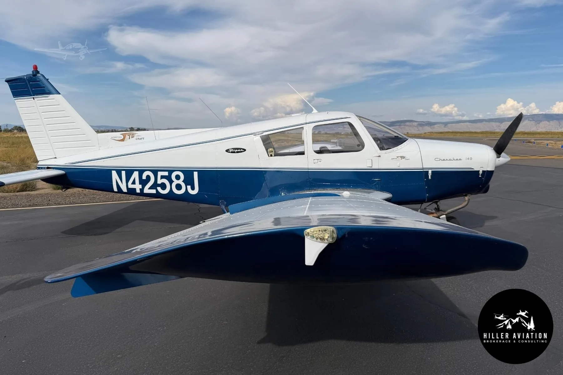 Exterior view of a 1967 PIPER CHEROKEE 140, N4258J.
