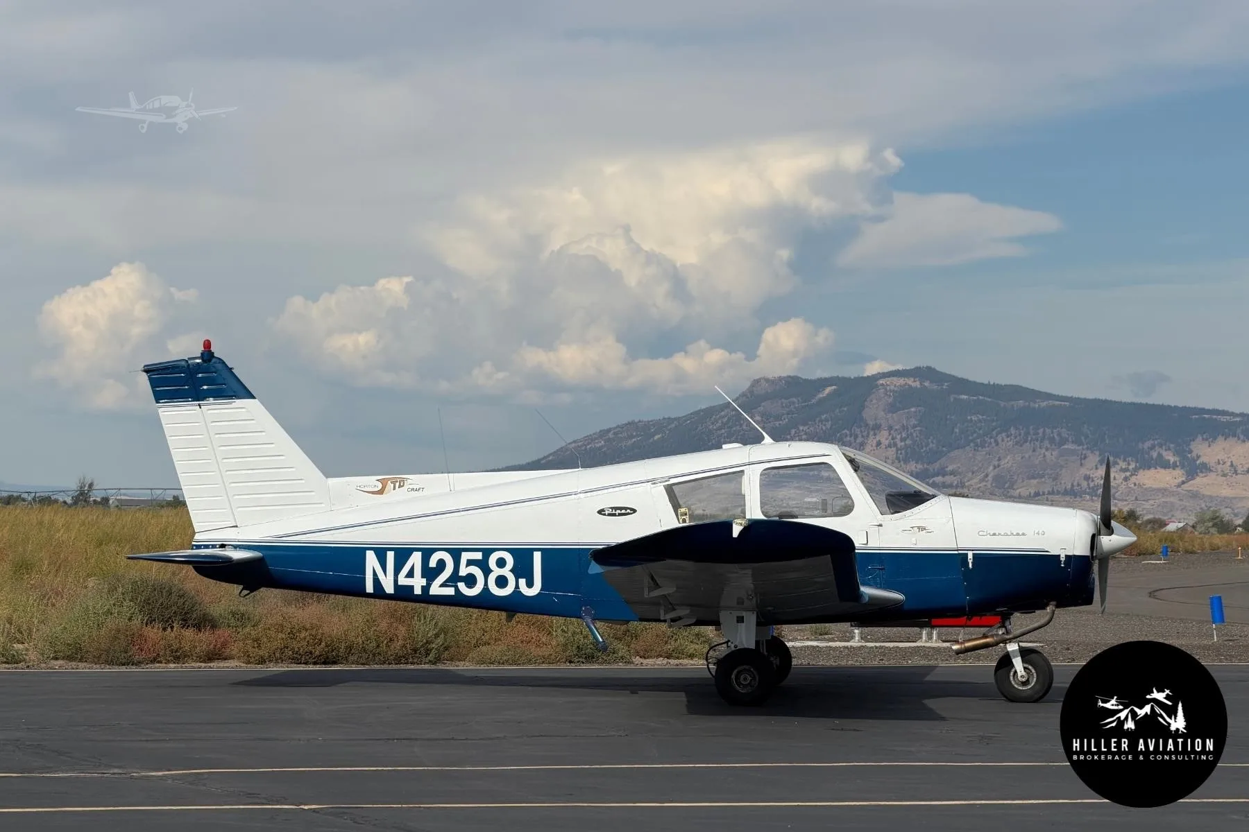 Exterior view of a 1967 PIPER CHEROKEE 140, N4258J.