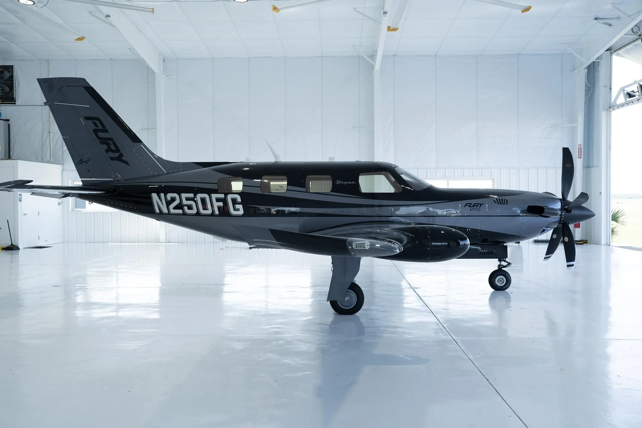 Exterior view of a 2026 PIPER M700, N250FG.