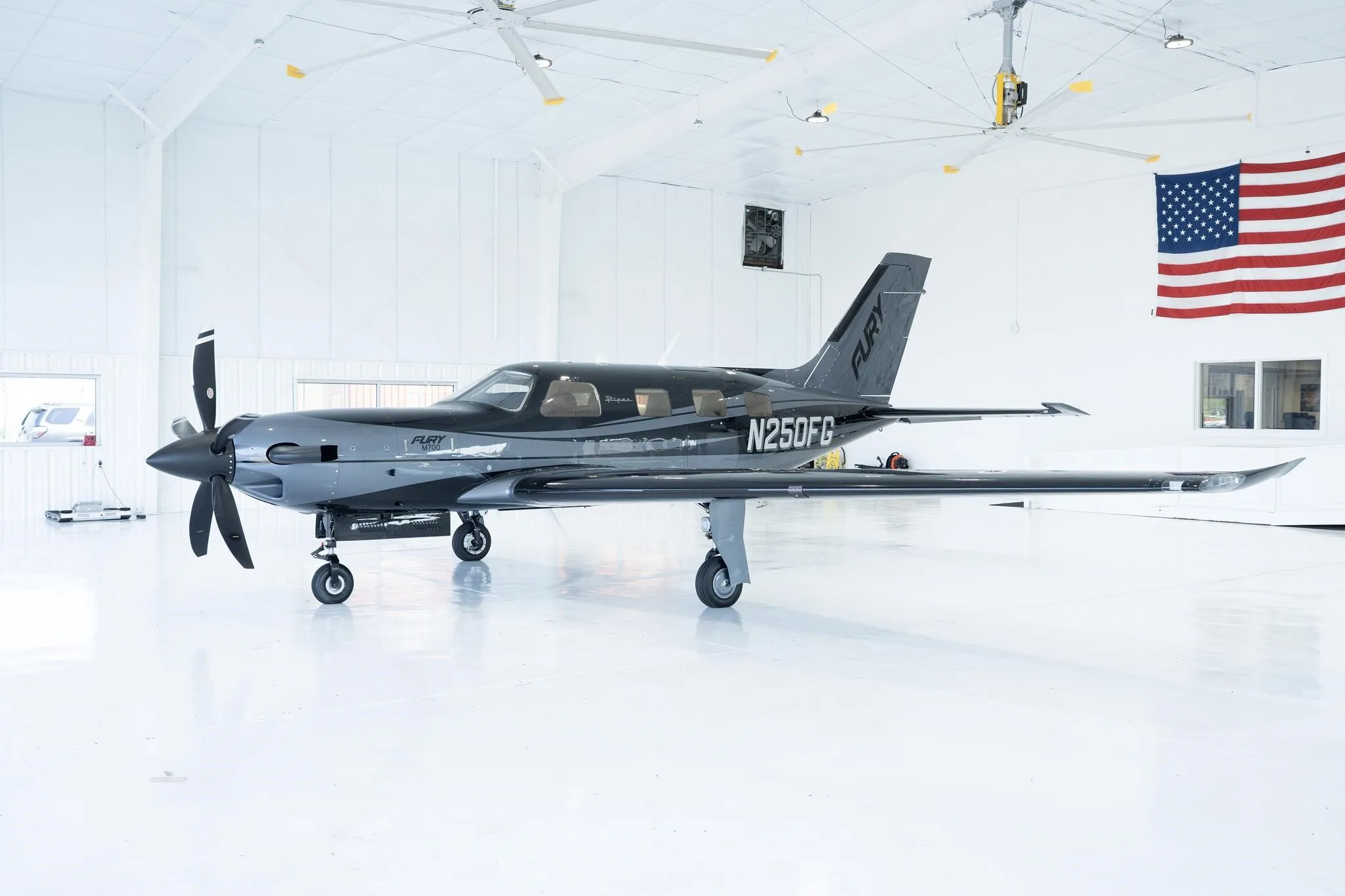 Exterior view of a 2026 PIPER M700, N250FG.