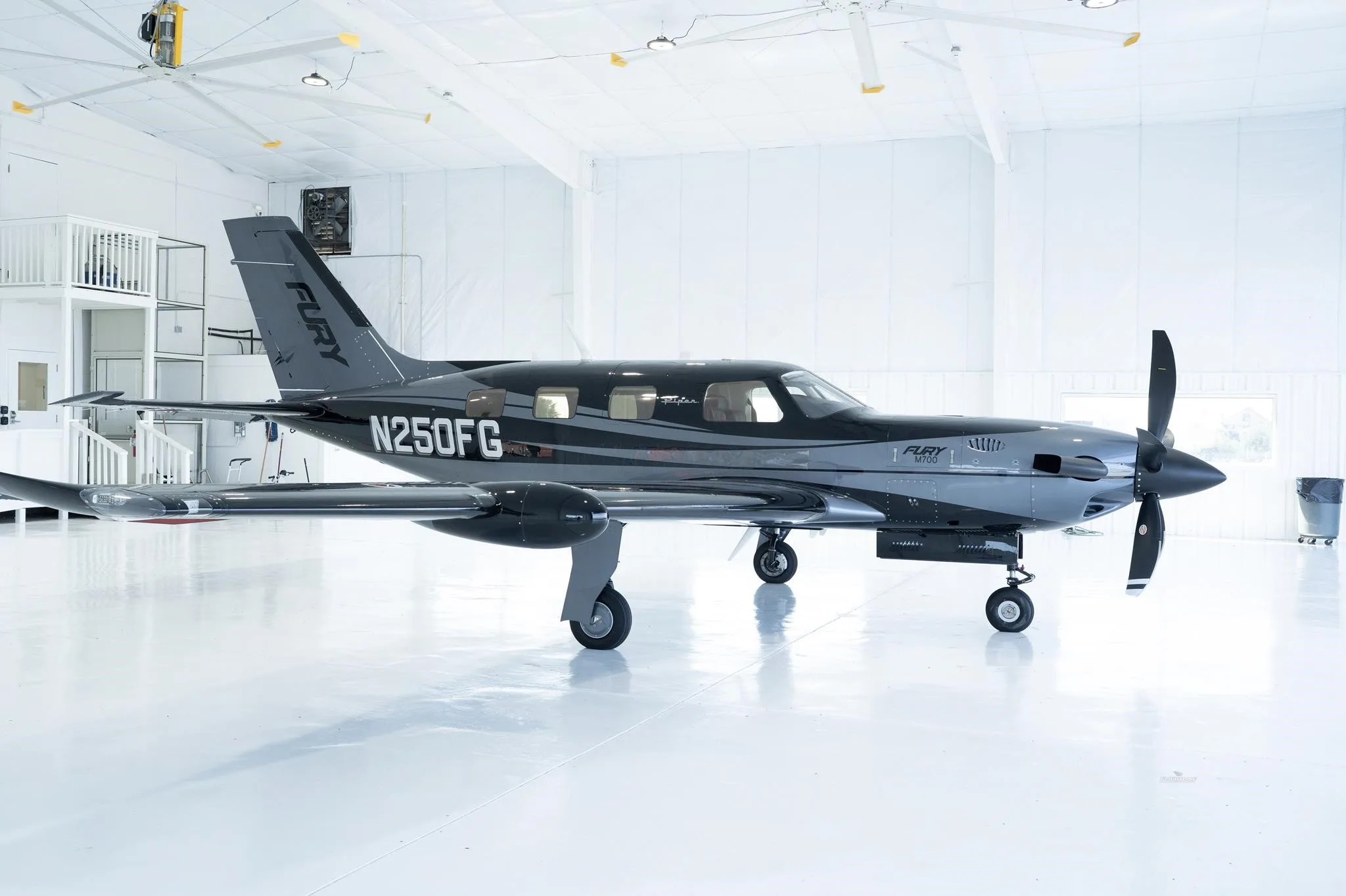 Exterior view of a 2026 PIPER M700, N250FG.