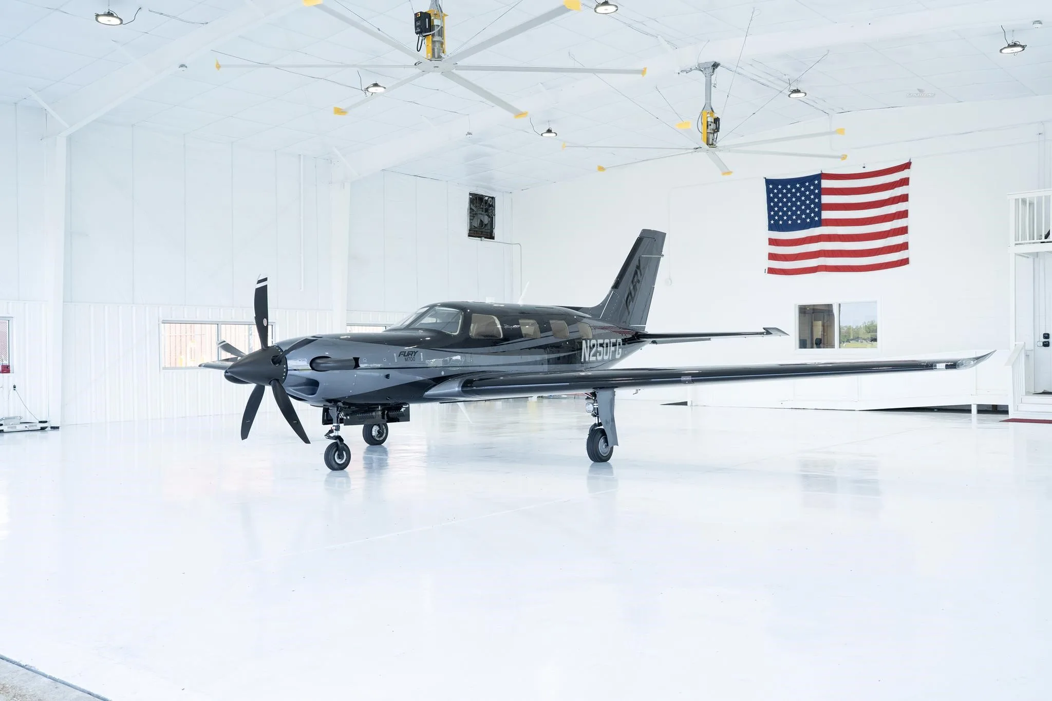 Exterior view of a 2026 PIPER M700, N250FG.
