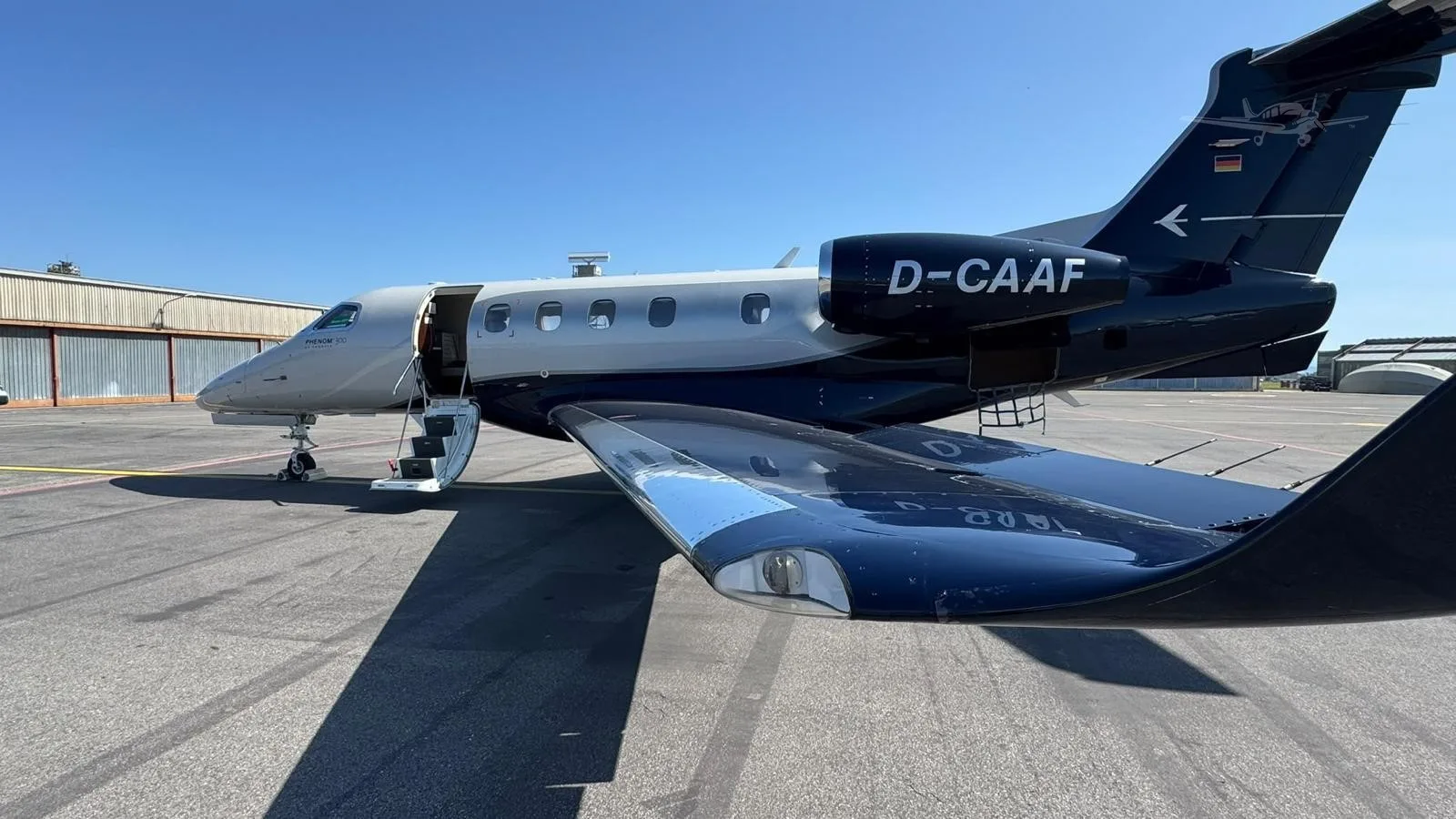 Exterior view of a 2016 EMBRAER PHENOM 300, D-CAAF.