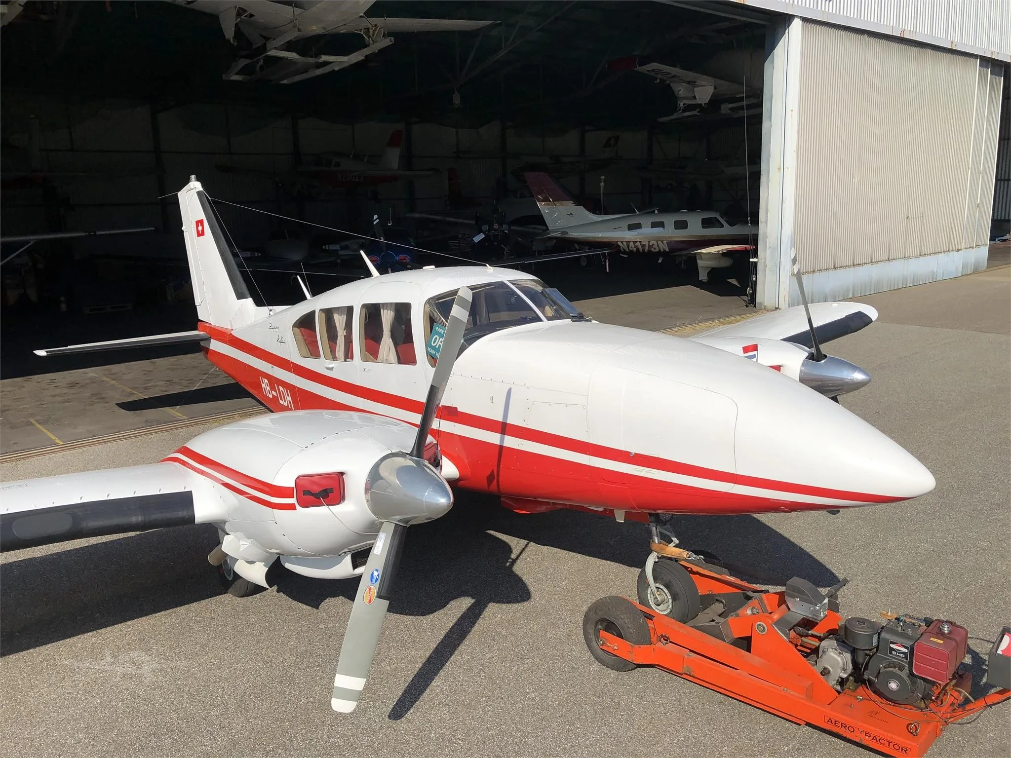 Exterior view of a 1966 PIPER TURBO AZTEC, HB-LDH.