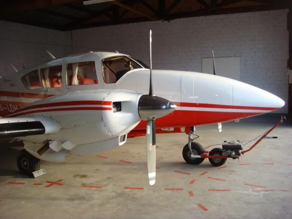 Exterior view of a 1966 PIPER TURBO AZTEC, HB-LDH.