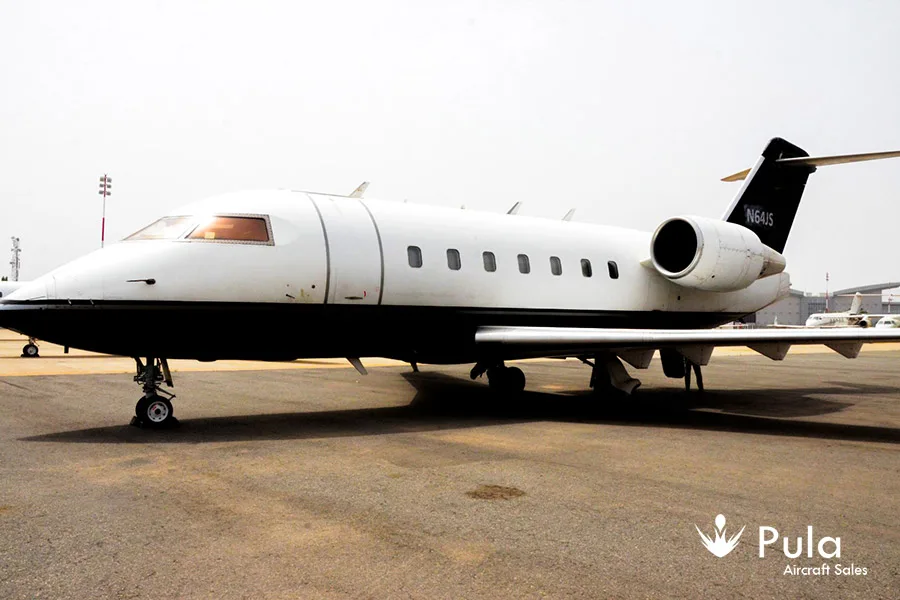 Exterior view of a 1992 Bombardier CHALLENGER 601-3A/ER, N64JS.