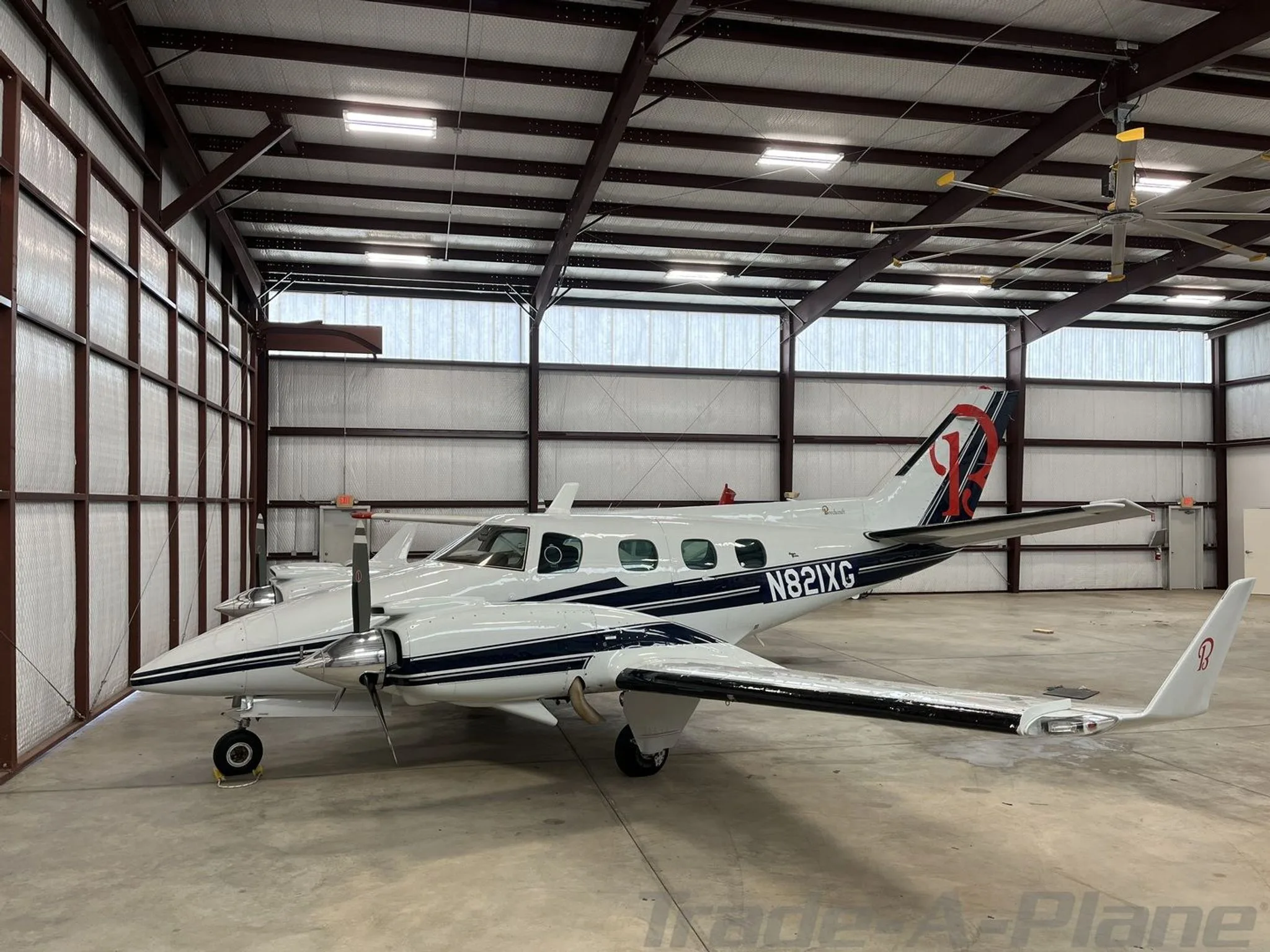 Exterior view of a 1975 BEECHCRAFT B60 DUKE, N821XG.