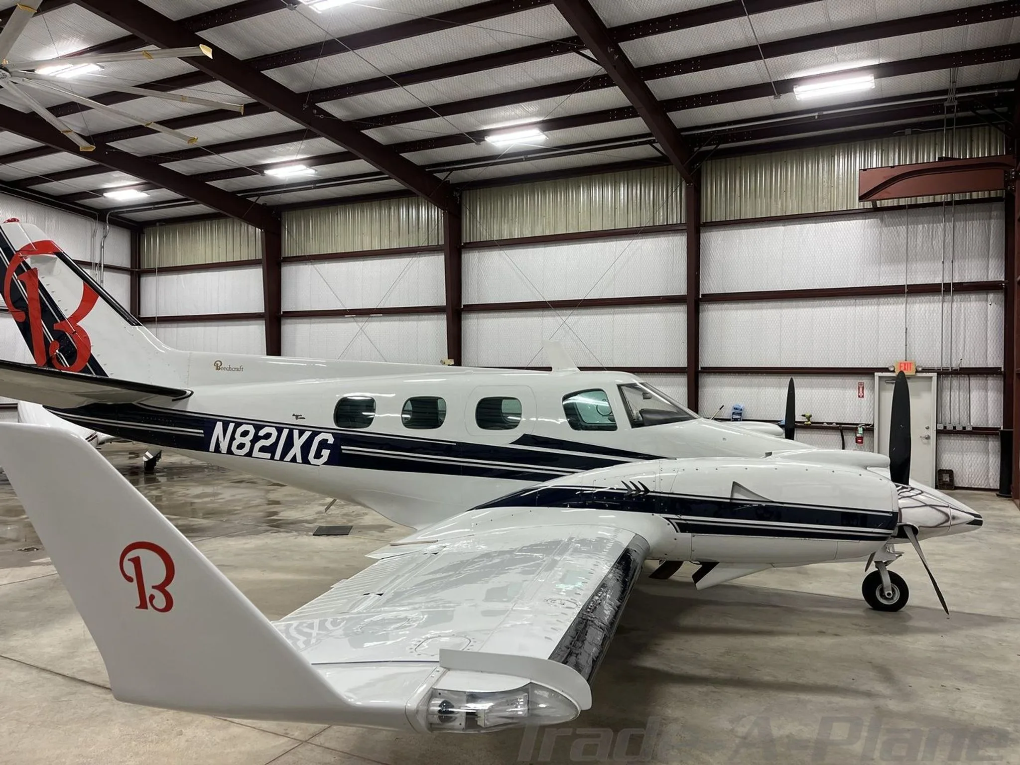 Exterior view of a 1975 BEECHCRAFT B60 DUKE, N821XG.