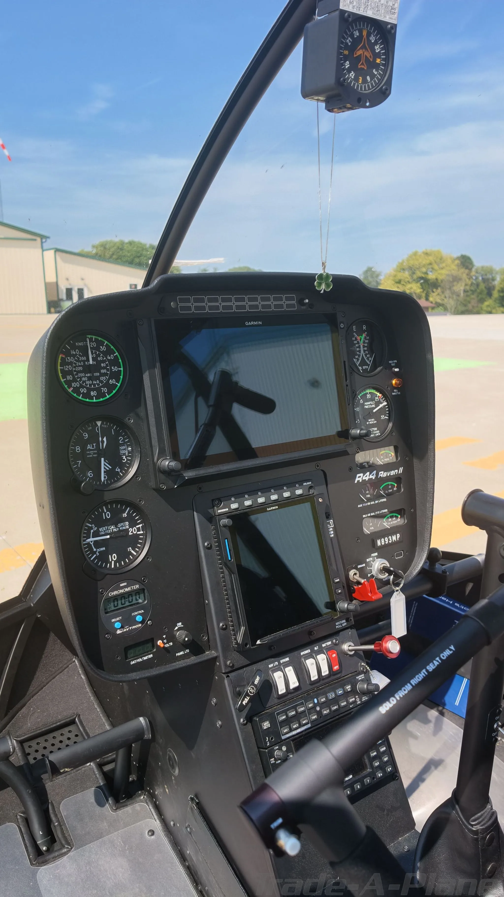 Cockpit and instrument panel of a 2025 ROBINSON R44 RAVEN II.