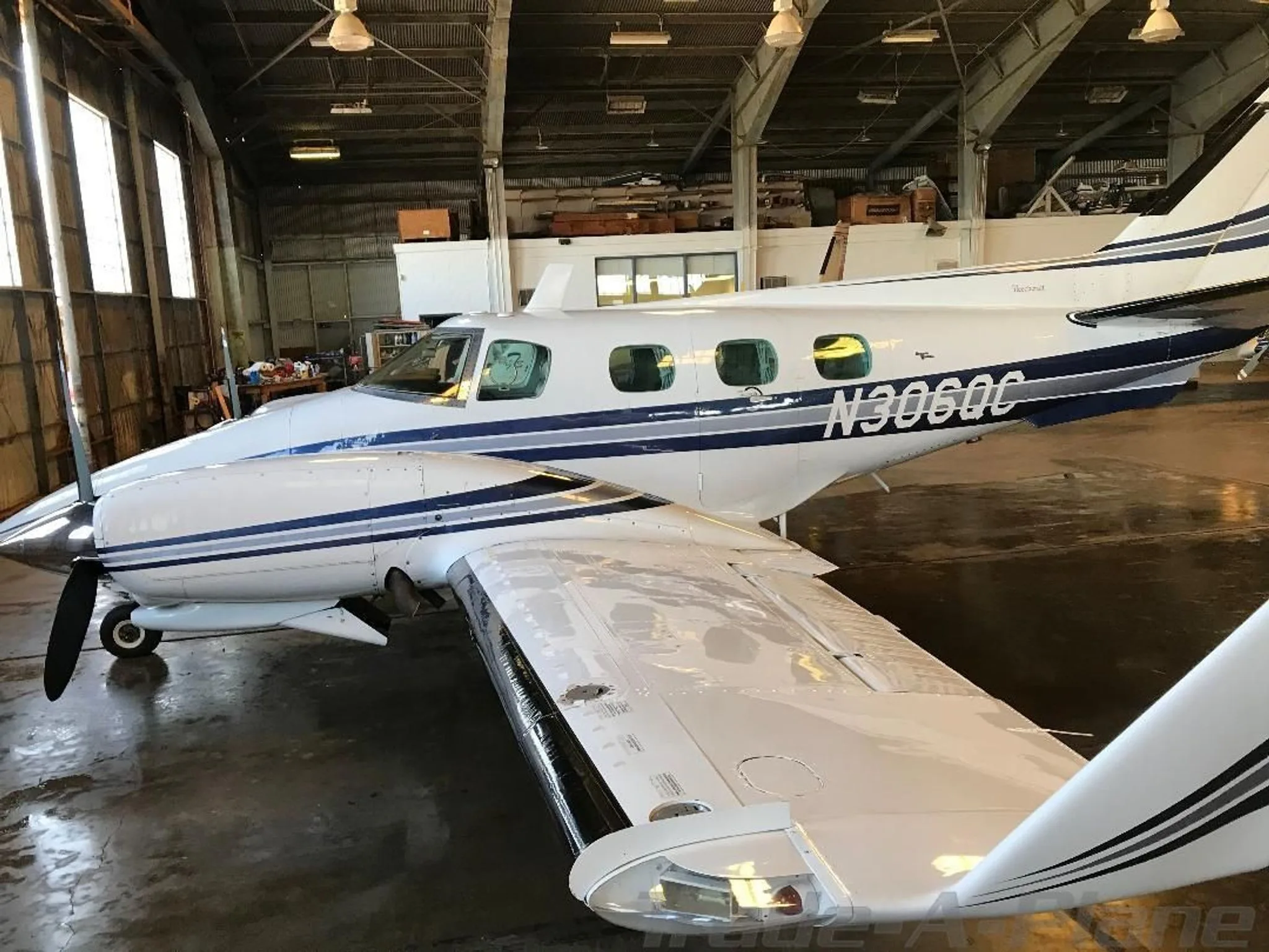 Exterior view of a 1972 BEECHCRAFT B60 DUKE, N306QC.