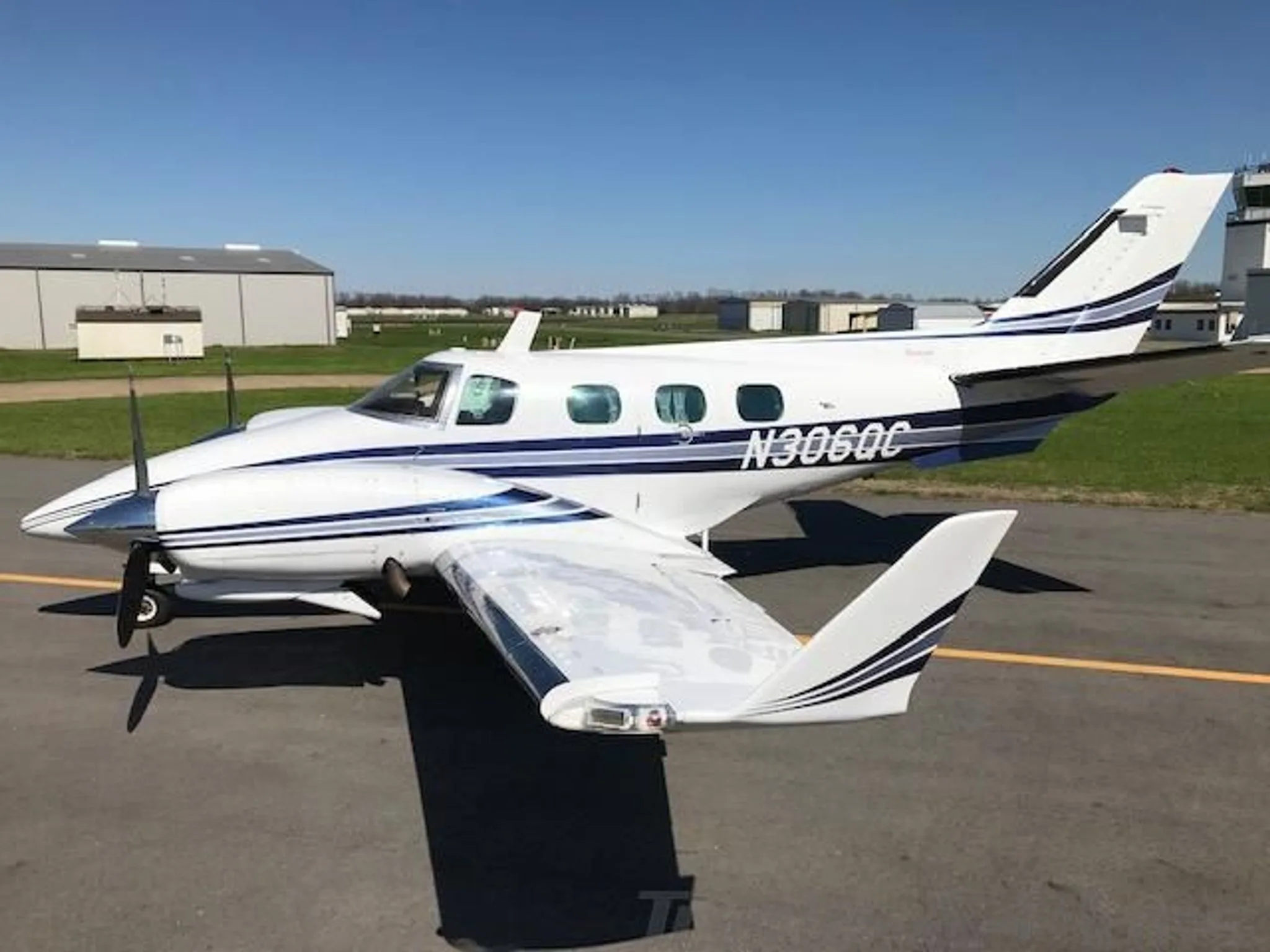 Exterior view of a 1972 BEECHCRAFT B60 DUKE, N306QC.