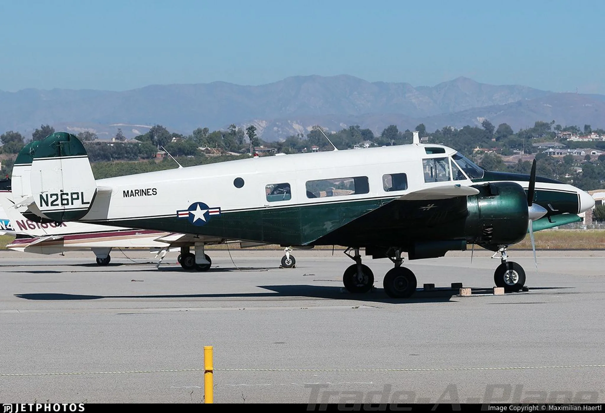 Exterior view of a 1964 BEECHCRAFT H18, N26PL.