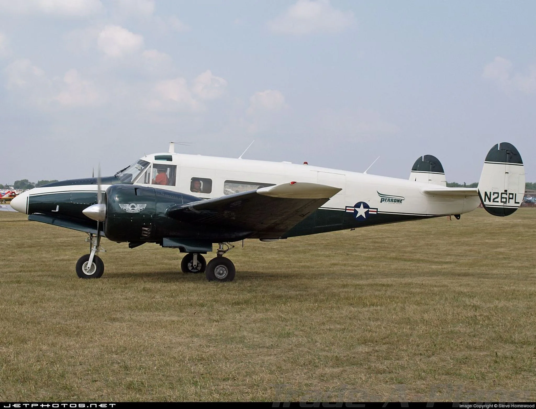 Exterior view of a 1964 BEECHCRAFT H18, N26PL.