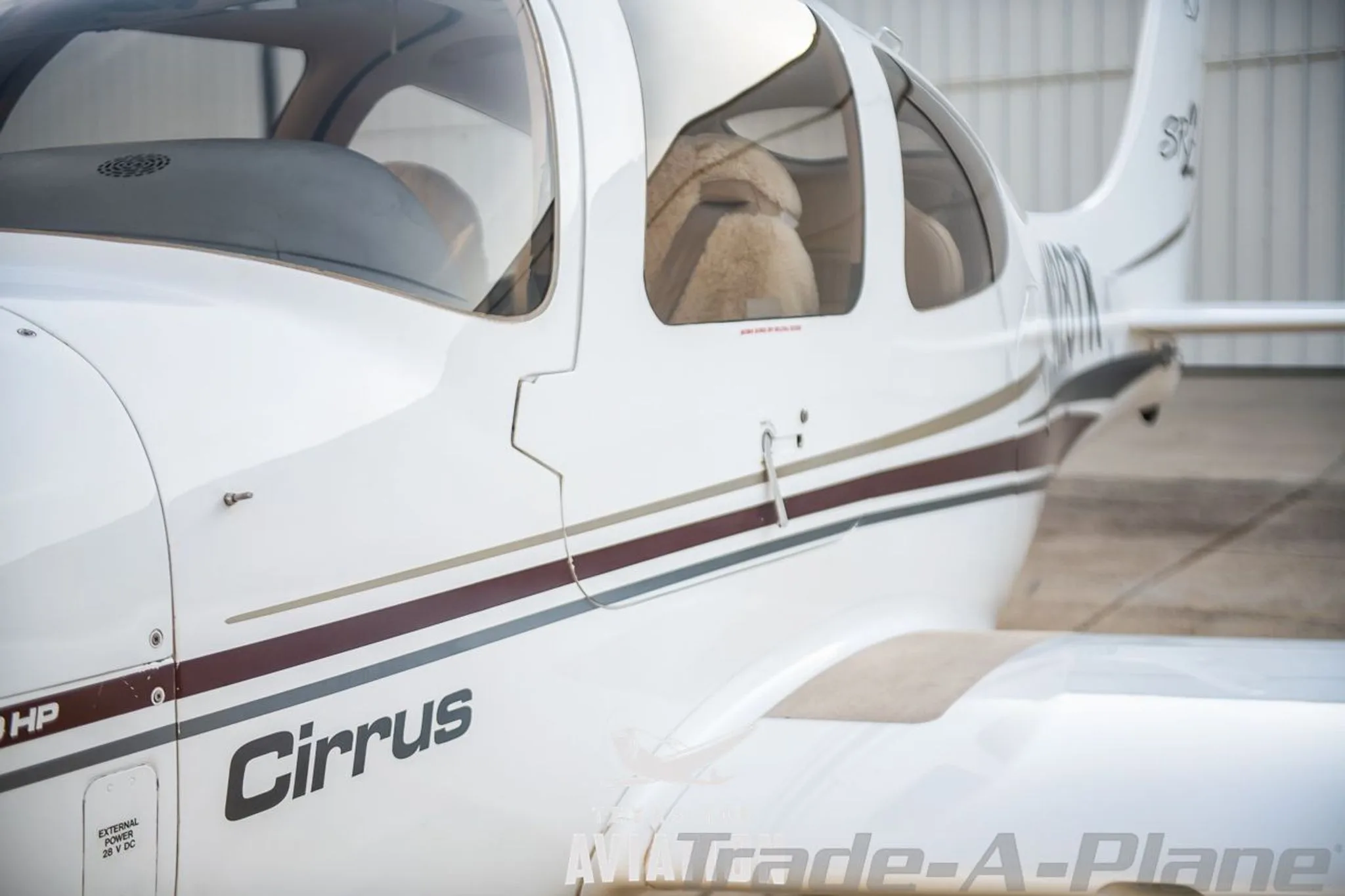 Exterior view of a 2002 CIRRUS SR22, N28TK.