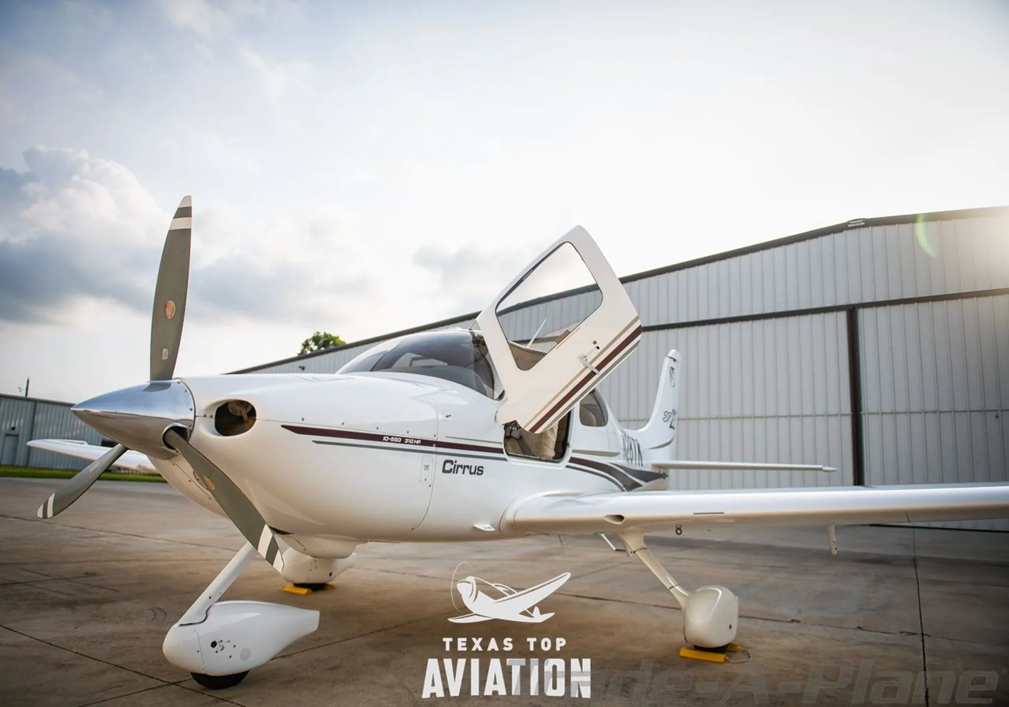 Exterior view of a 2002 CIRRUS SR22, N28TK.