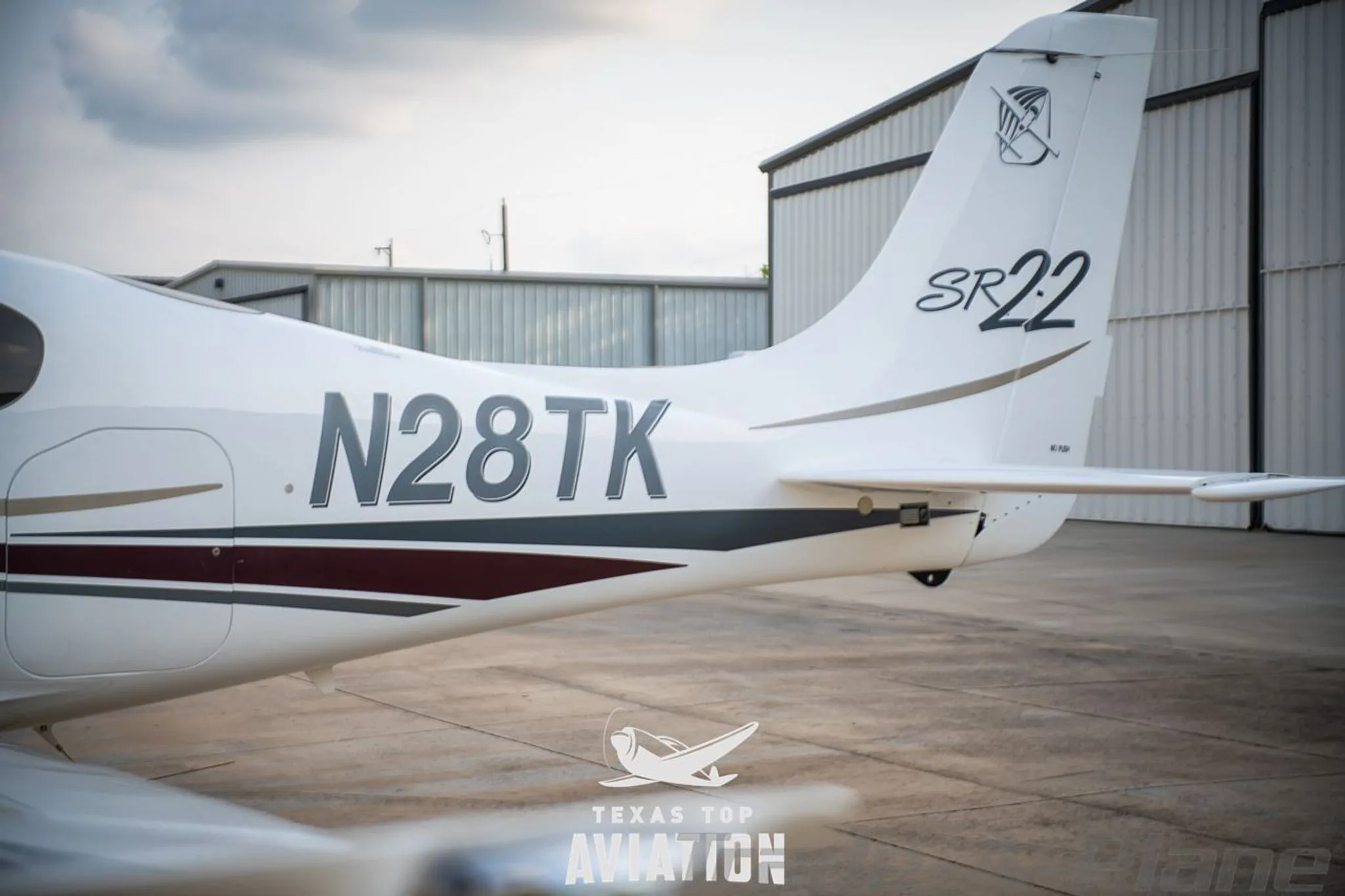 Exterior view of a 2002 CIRRUS SR22, N28TK.