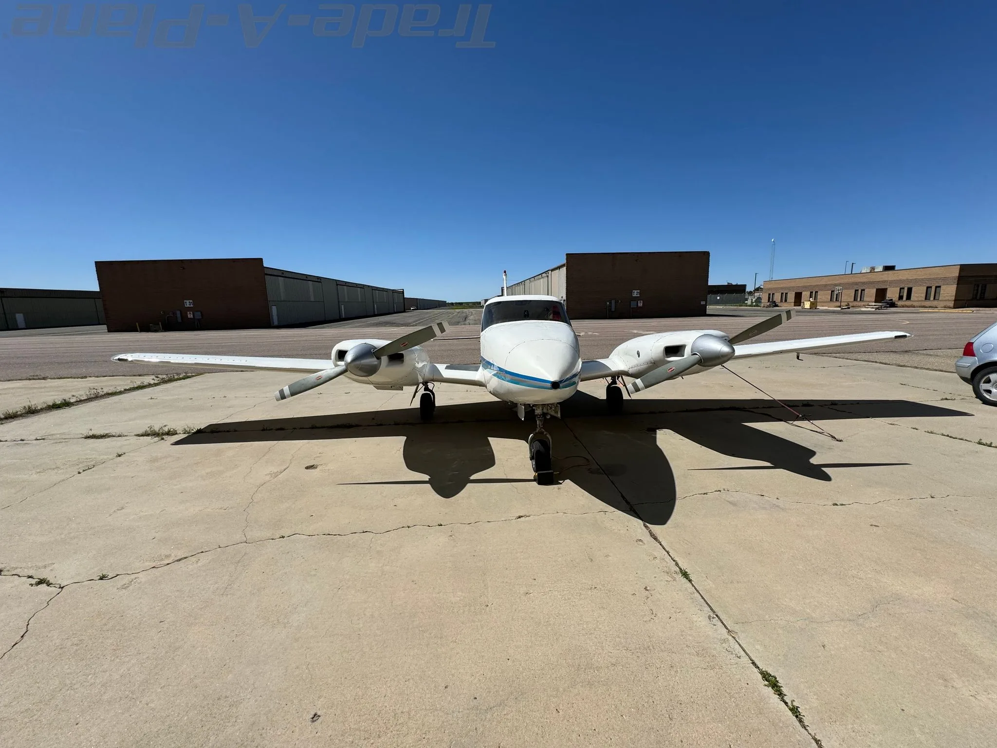 Exterior view of a 1966 PIPER TWIN COMANCHE, N1206A.