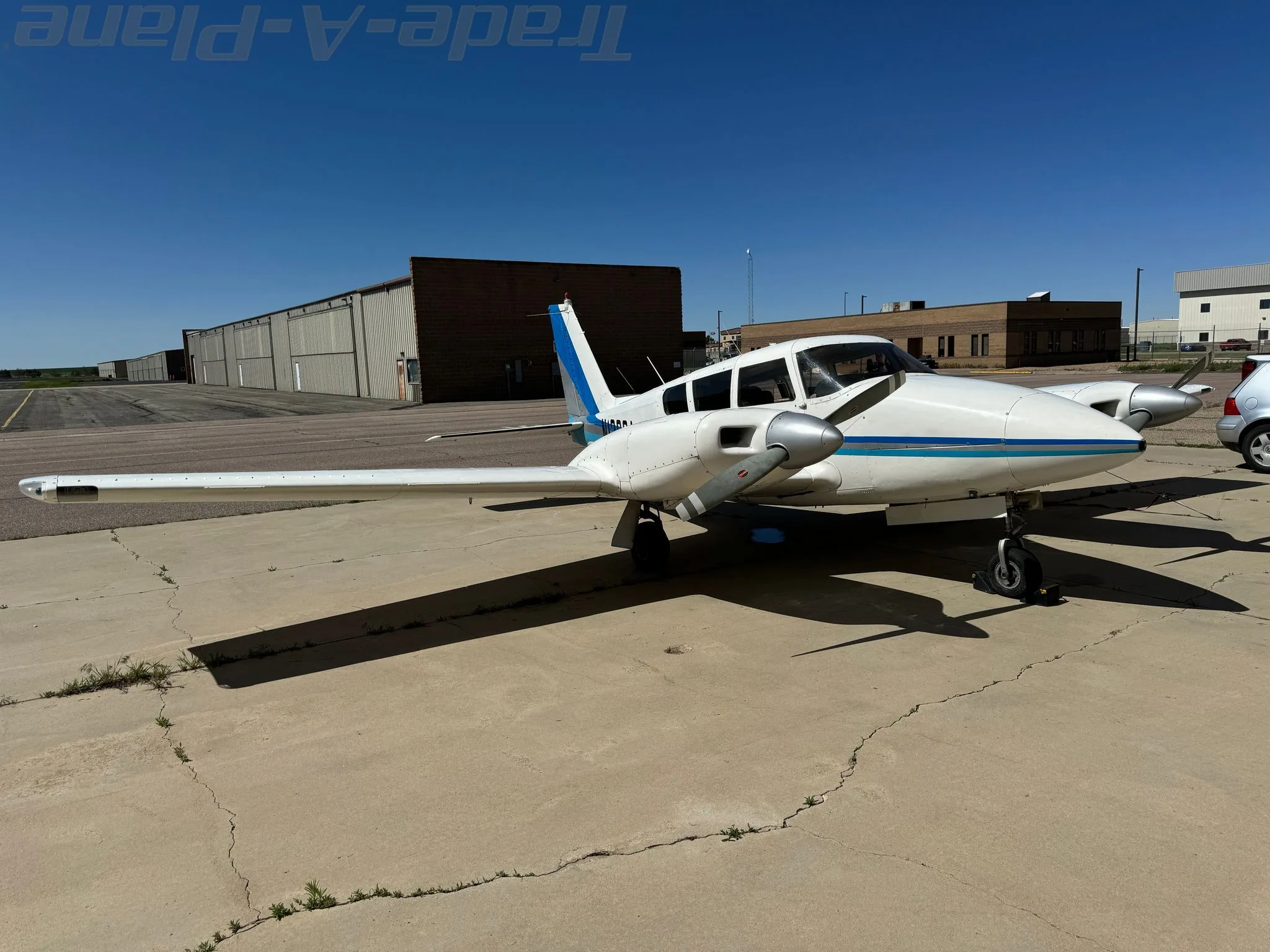 Exterior view of a 1966 PIPER TWIN COMANCHE, N1206A.