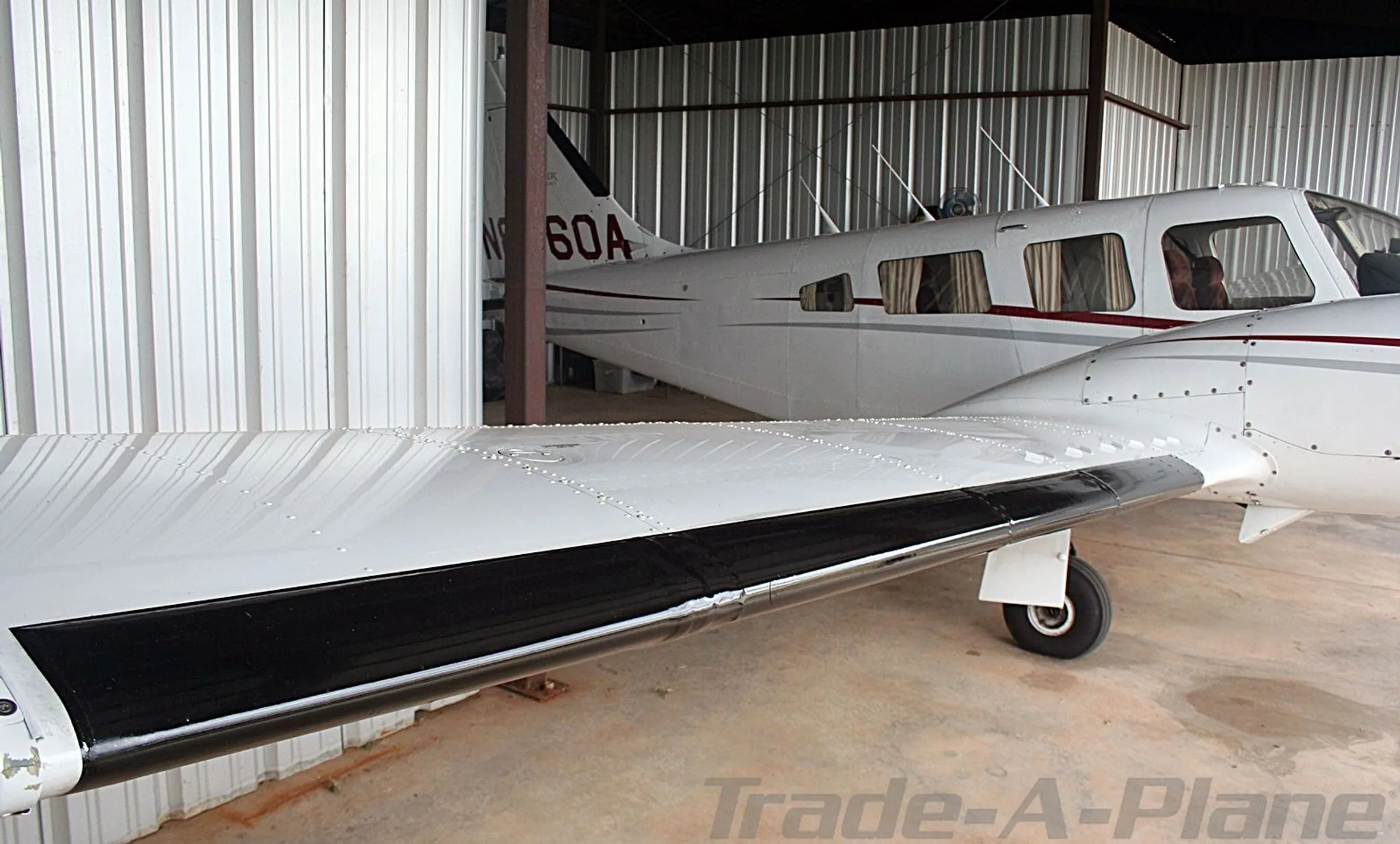 Exterior view of a 1982 PIPER SENECA III, N8460A.