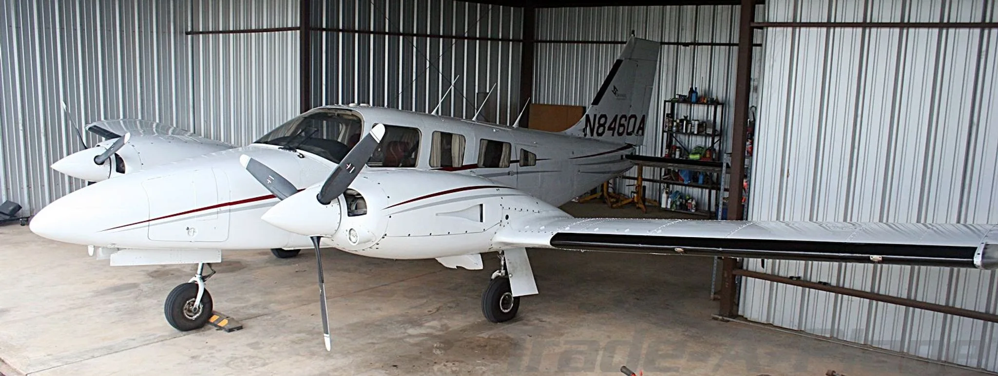Exterior view of a 1982 PIPER SENECA III, N8460A.